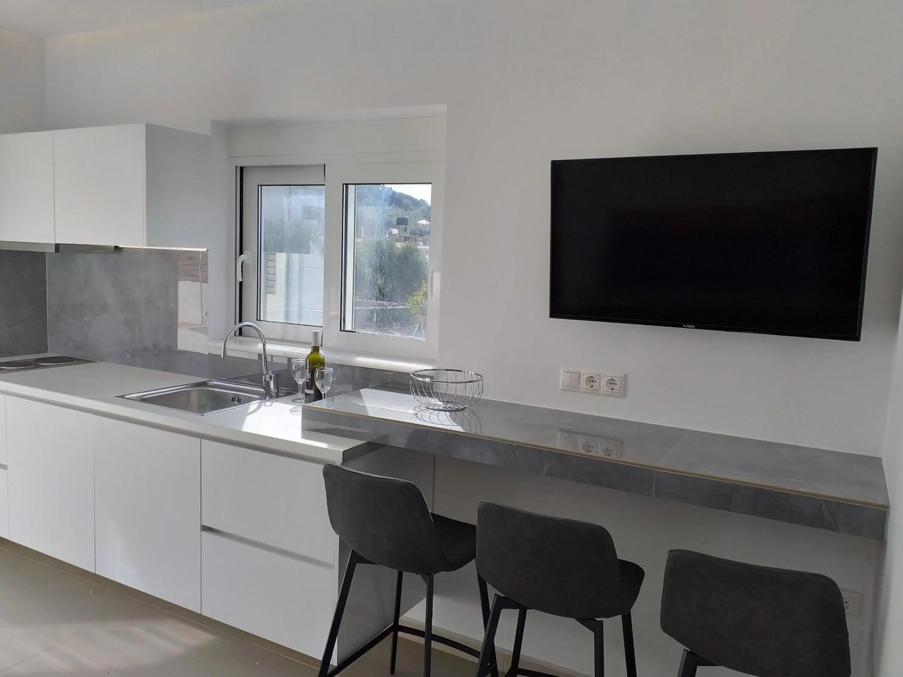 Kitchen or kitchenette in Aestas Apartments