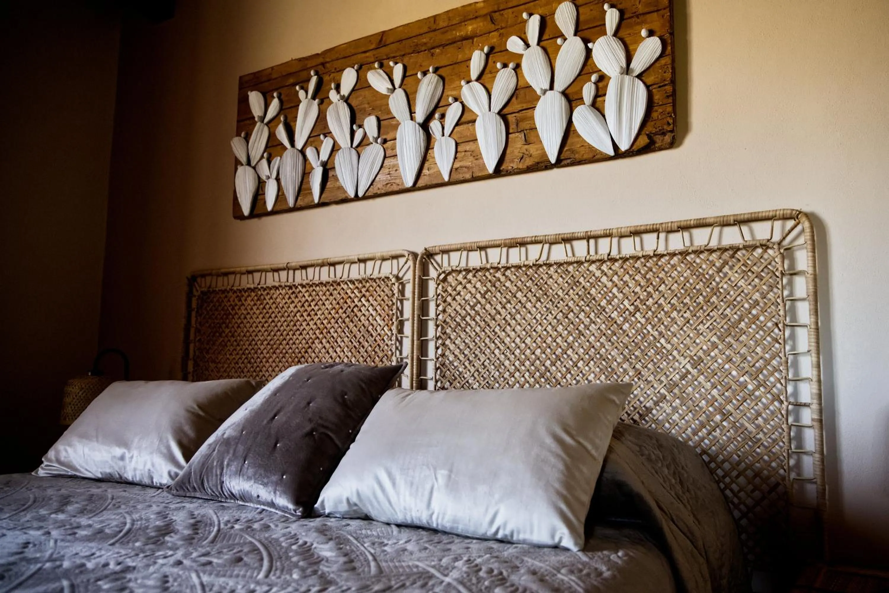 Bed in Relais Garden Cactus B&B