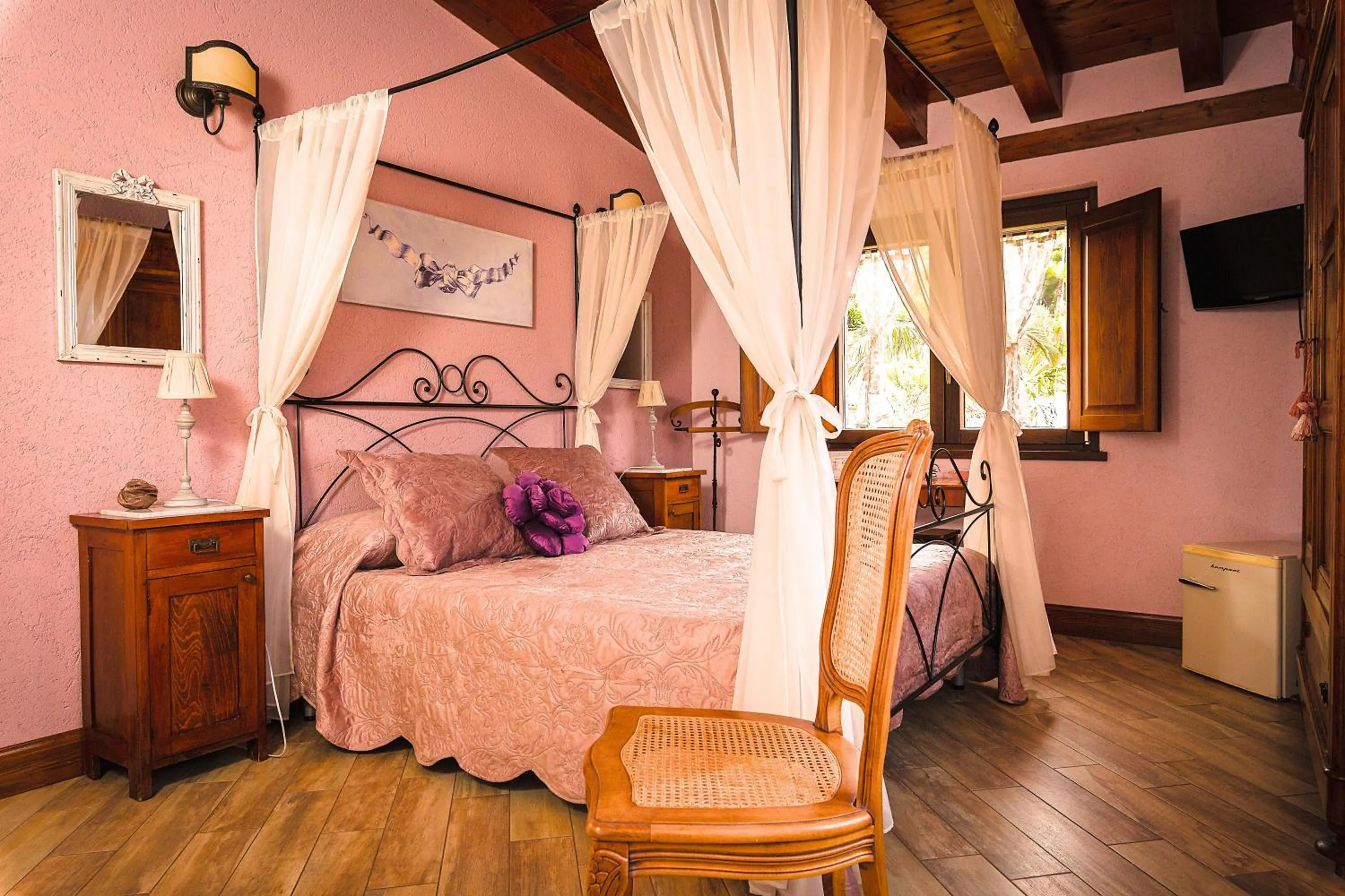 Bed in Relais Garden Cactus B&B