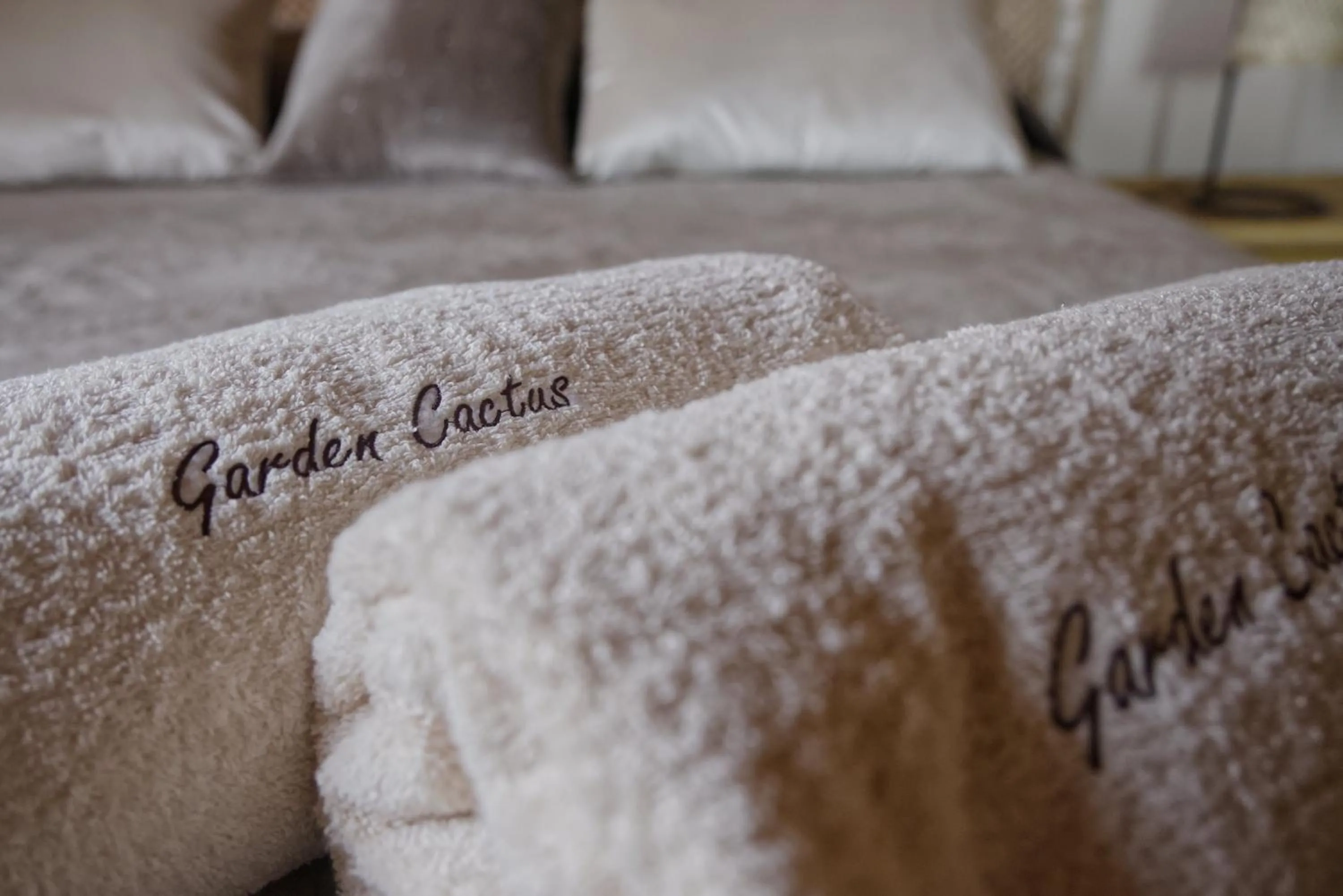 Bed in Relais Garden Cactus B&B