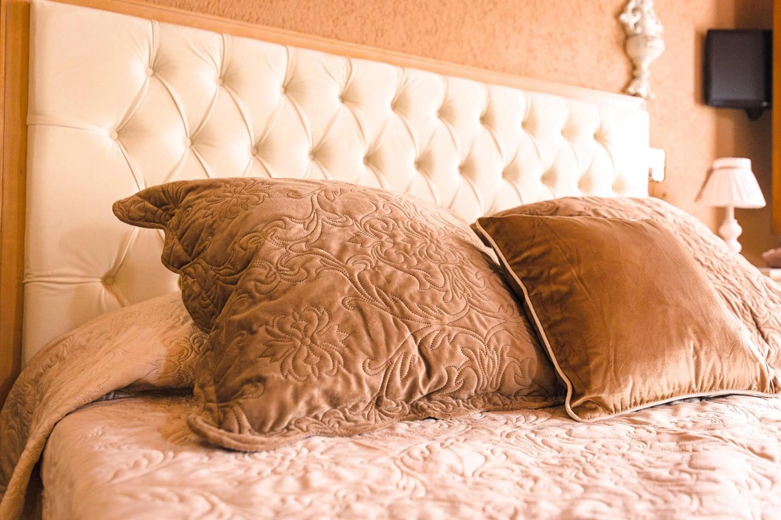 Bed in Relais Garden Cactus B&B