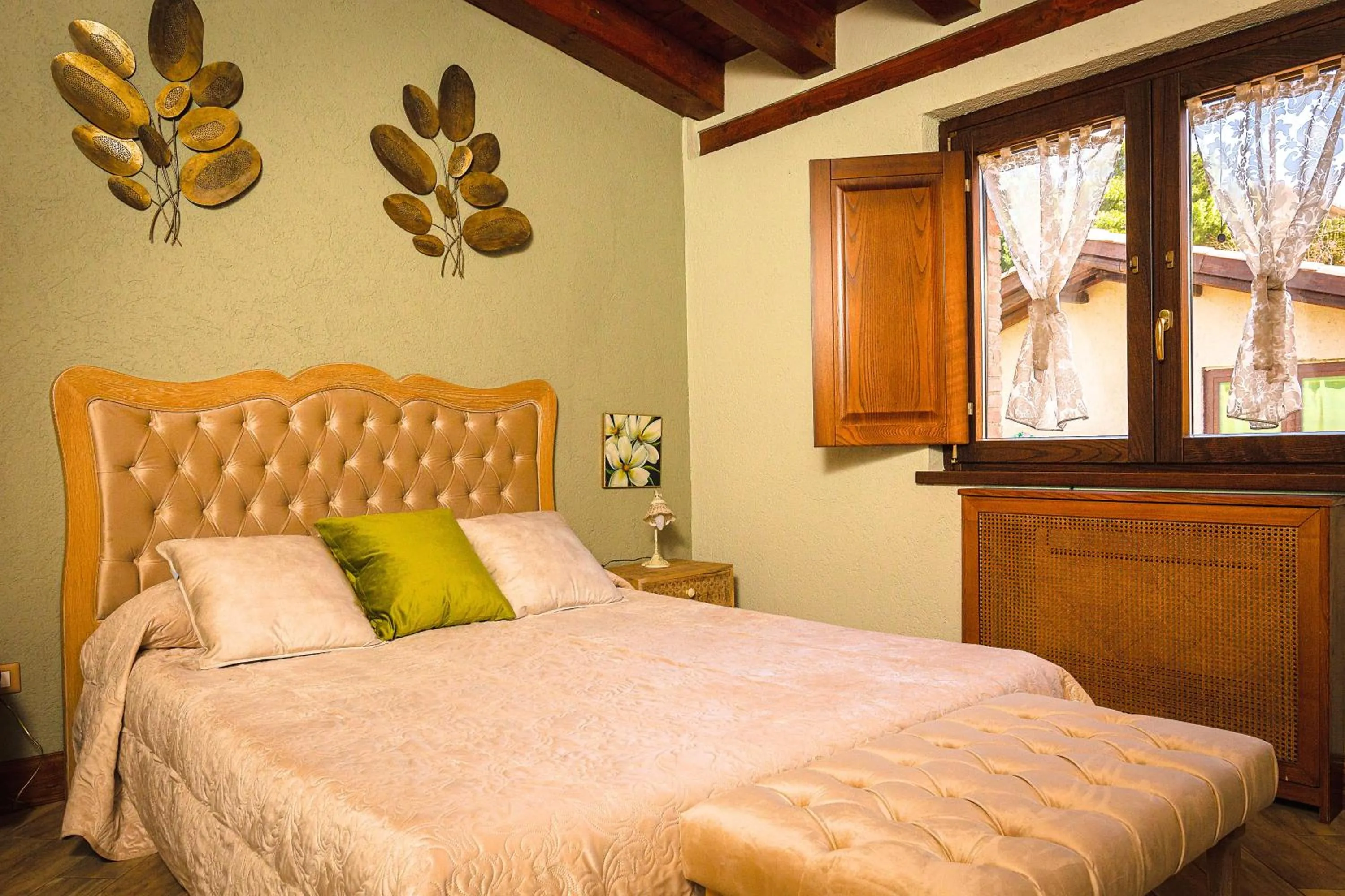 Bed in Relais Garden Cactus B&B