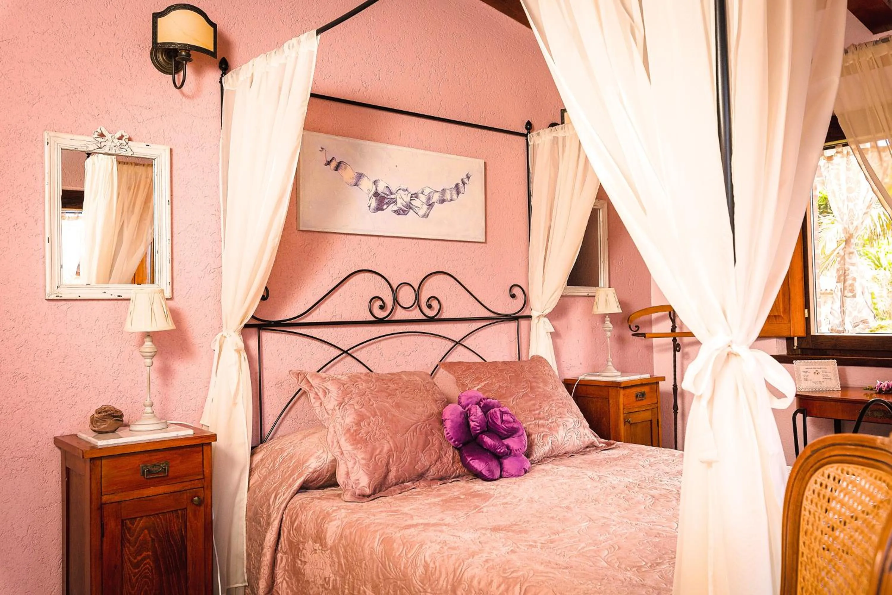 Bed in Relais Garden Cactus B&B