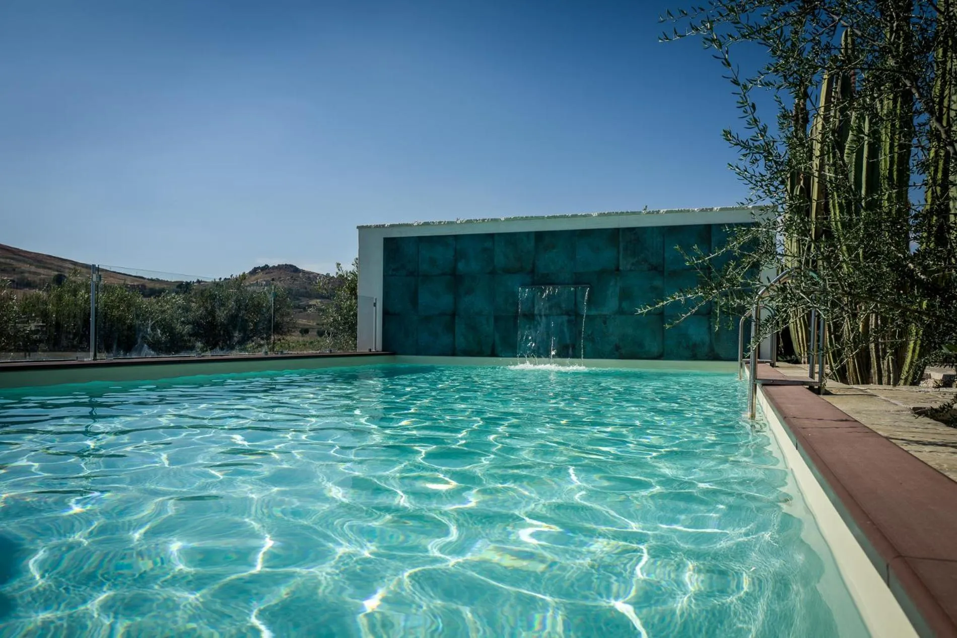 Swimming pool in Relais Garden Cactus B&B