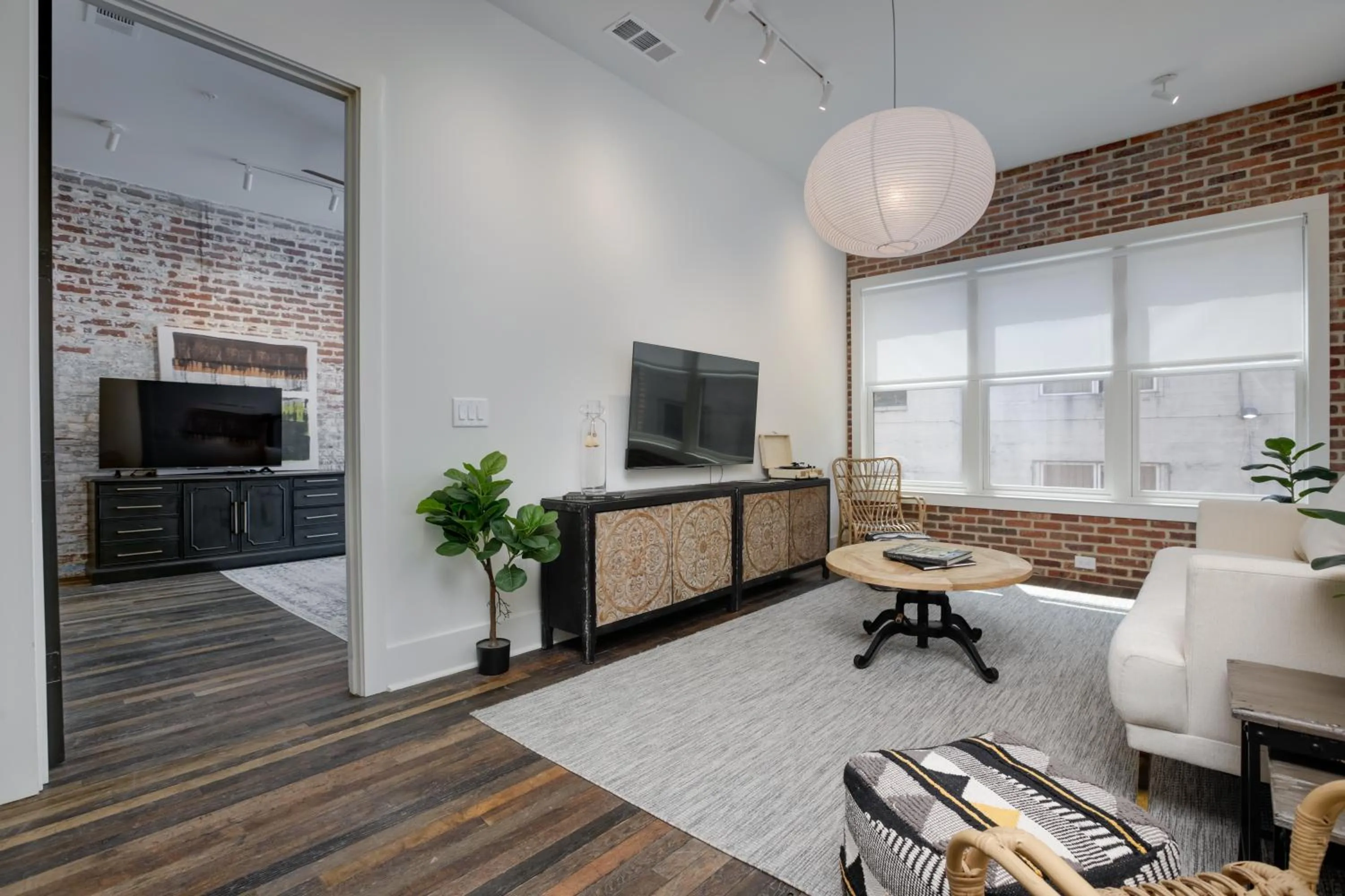 Living room in Loft condo by Mercedes Benz w balcony Apt 101