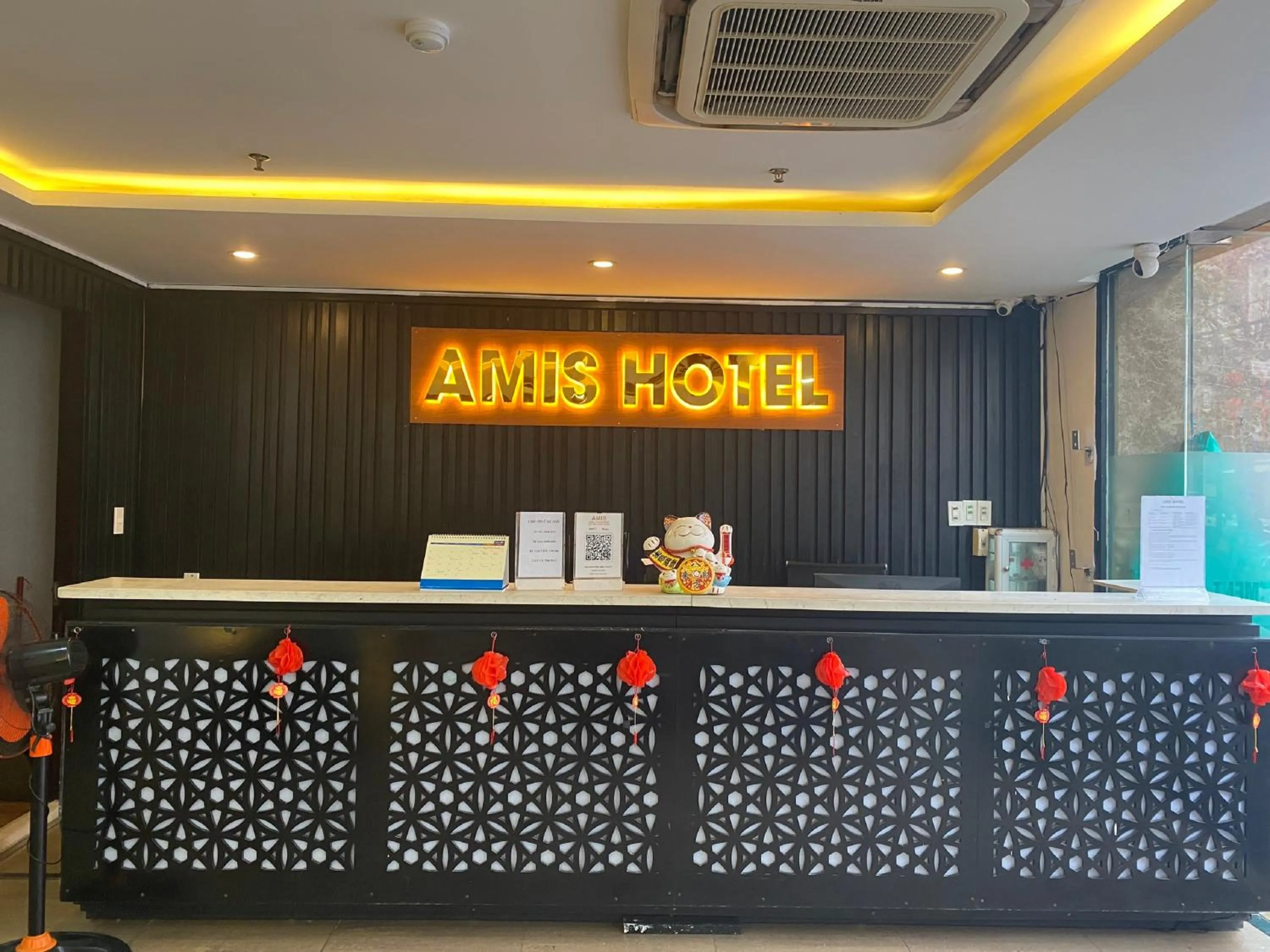 Property logo or sign in Amis Hotel & Apartment - 50m to My Khe Beach