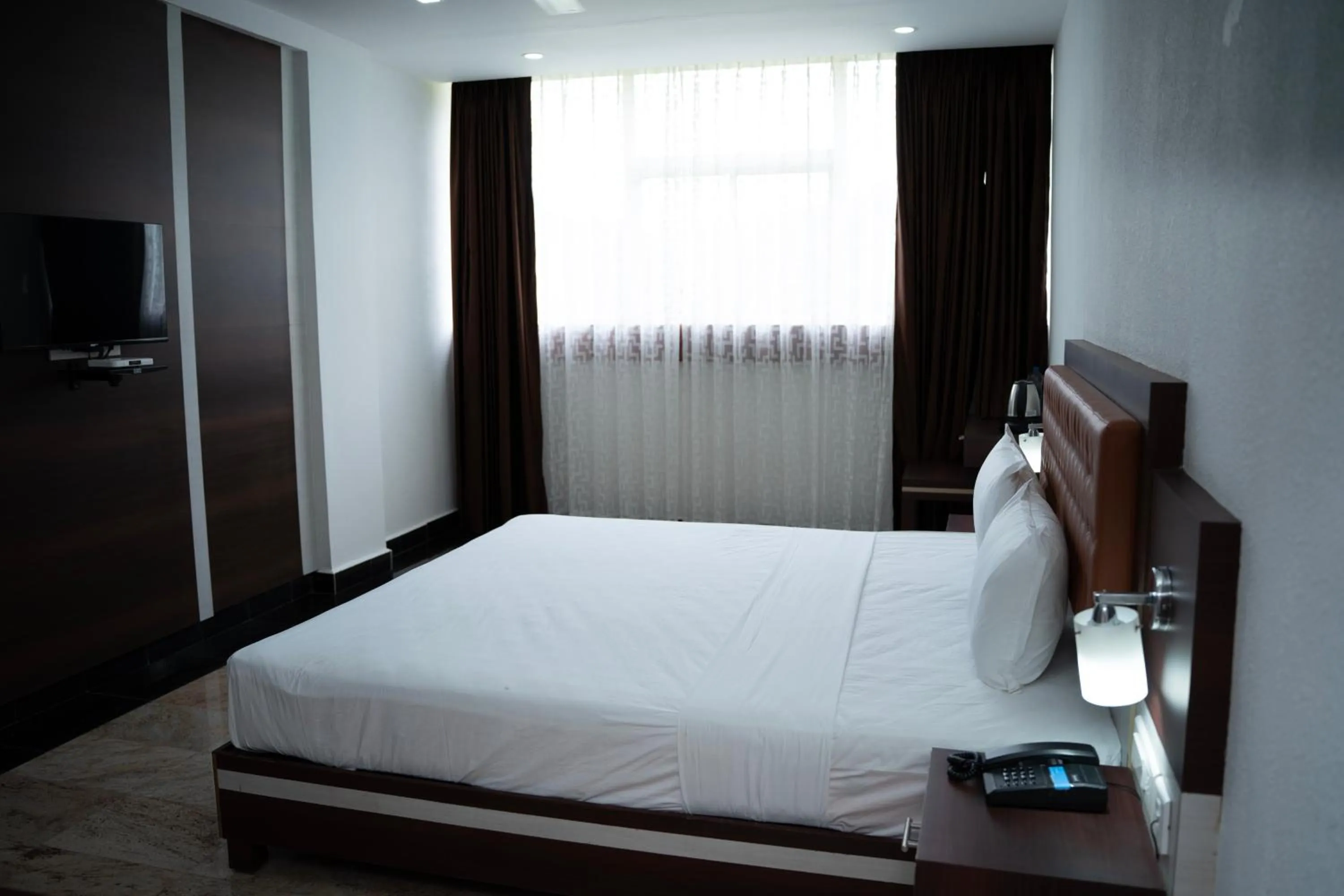 Bed in Hotel Idukki Castle