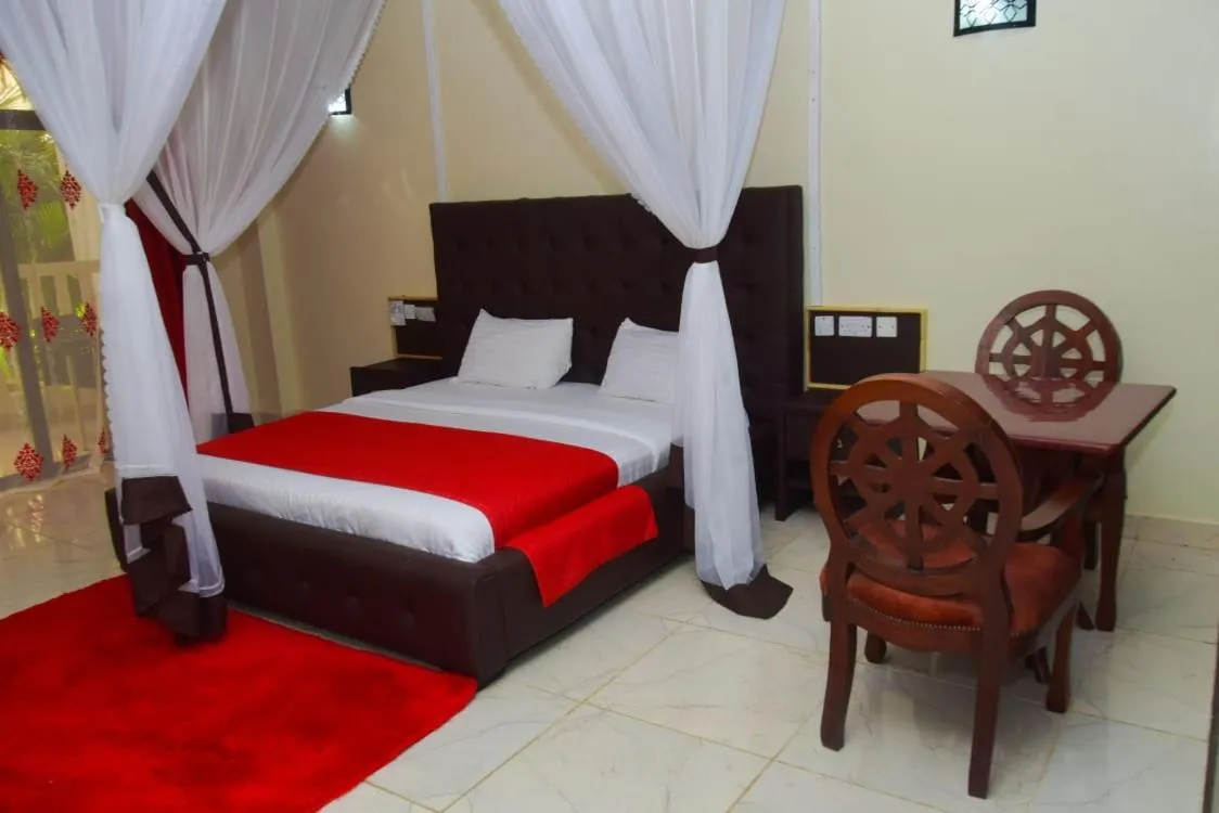 Bed in White Peacock Resort Mtwapa