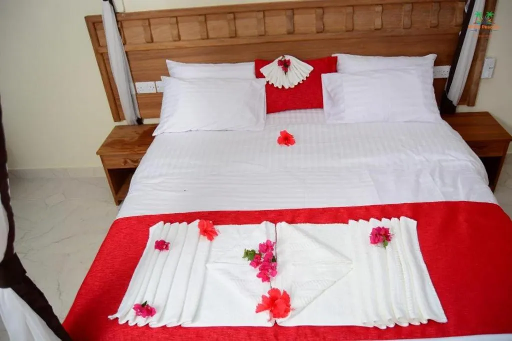 Bed in White Peacock Resort Mtwapa