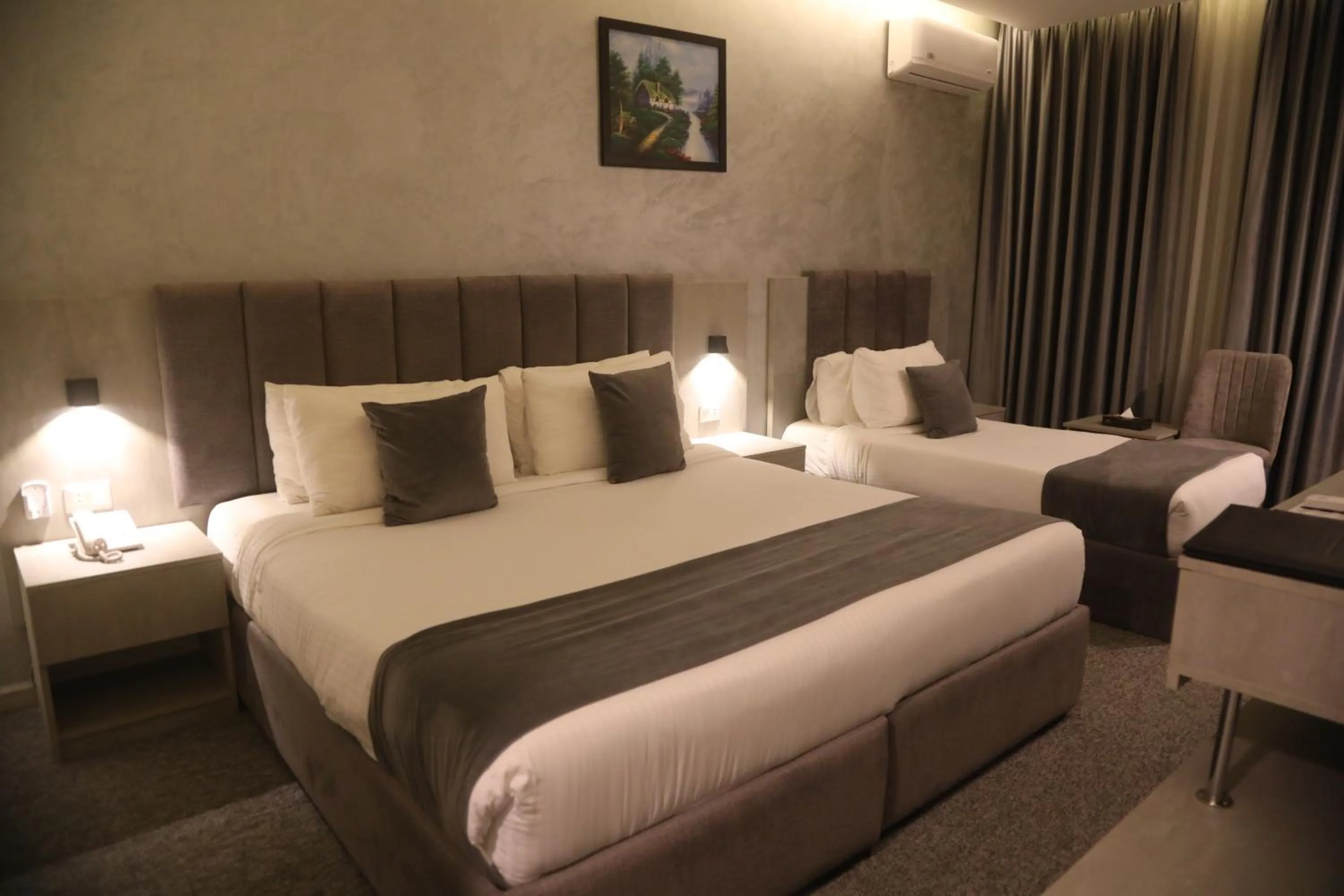 Bed in Kaya Hotel Amman