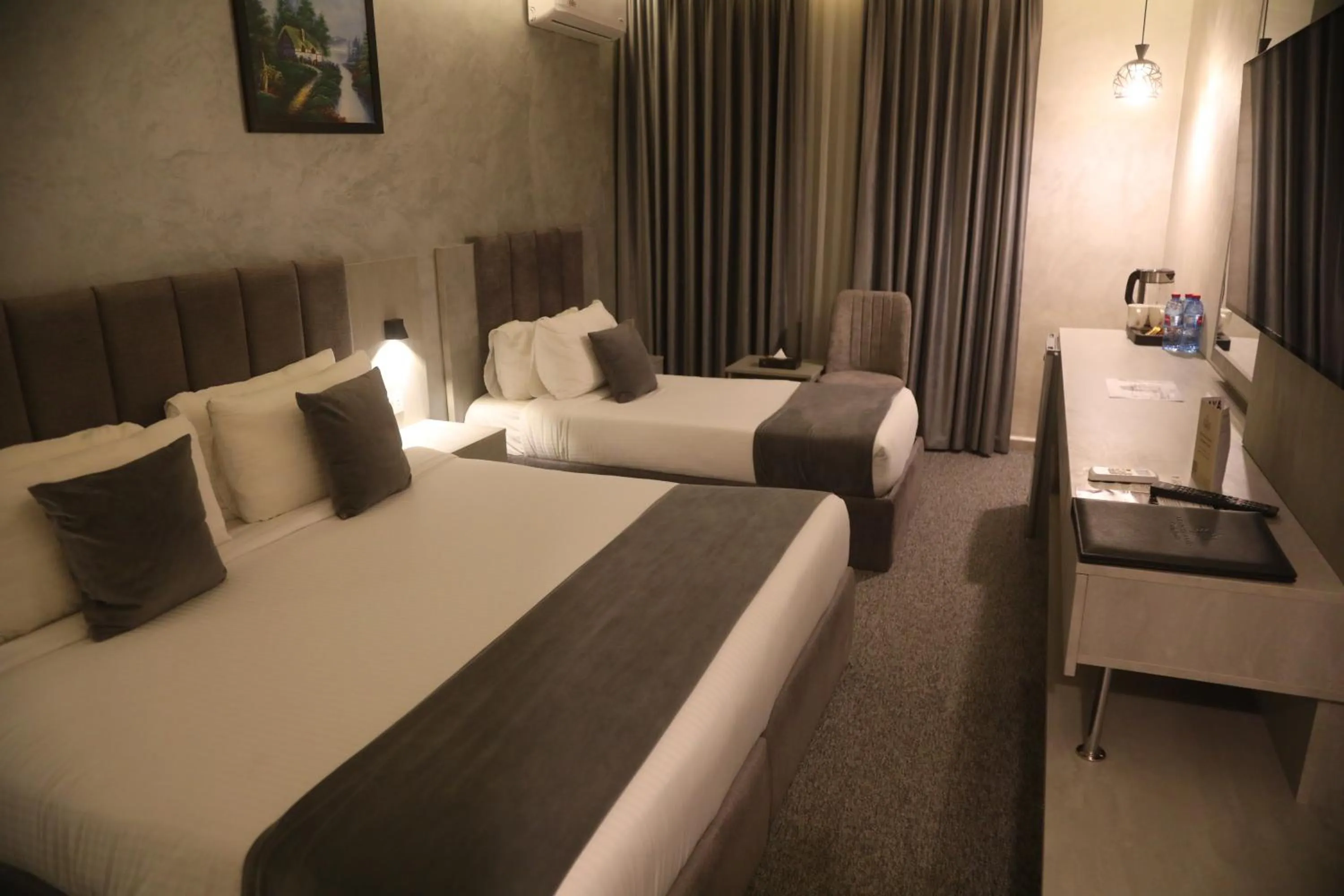 Bed in Kaya Hotel Amman