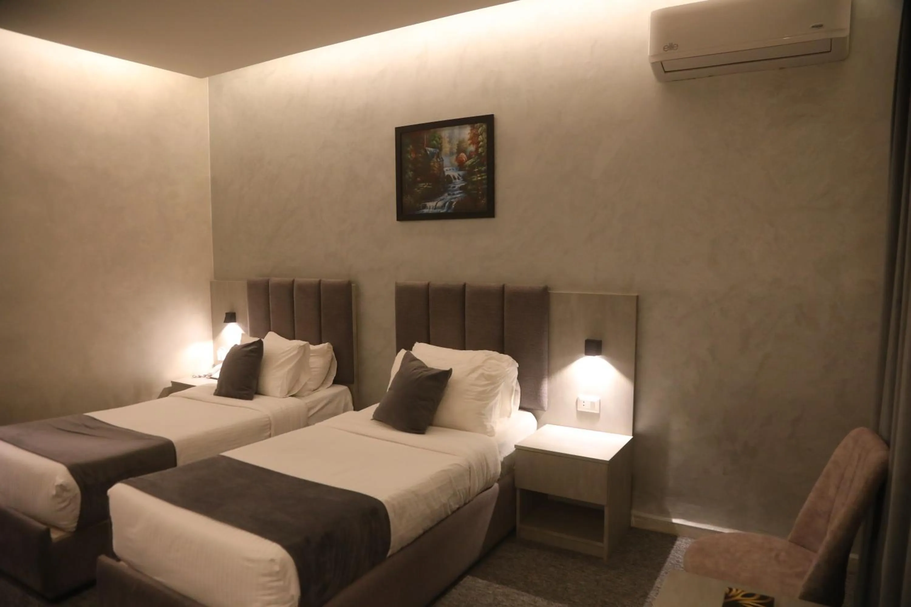 Bed in Kaya Hotel Amman