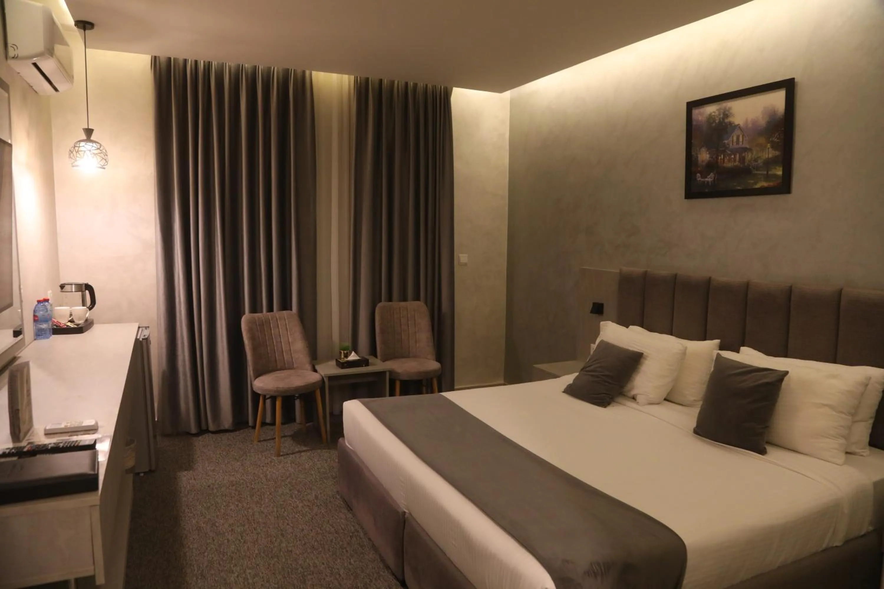 Bed in Kaya Hotel Amman