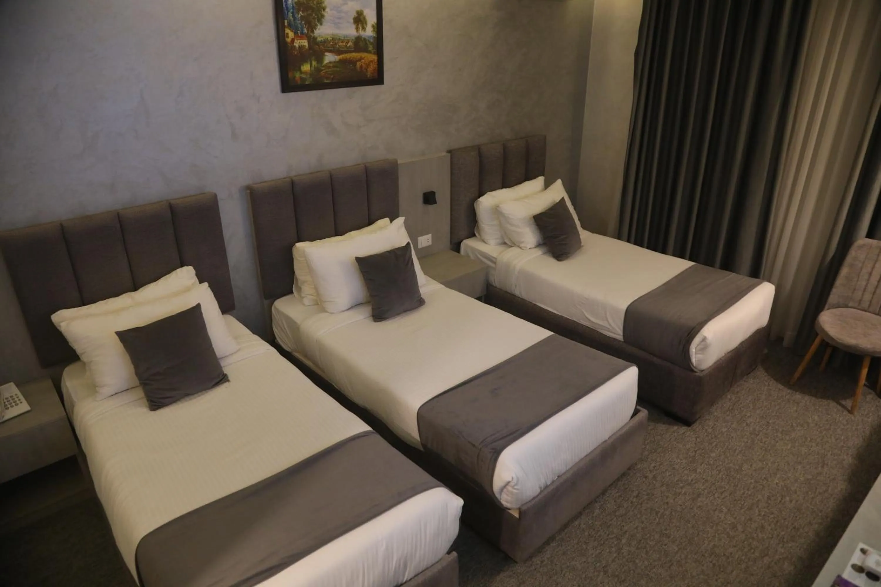 Bed in Kaya Hotel Amman