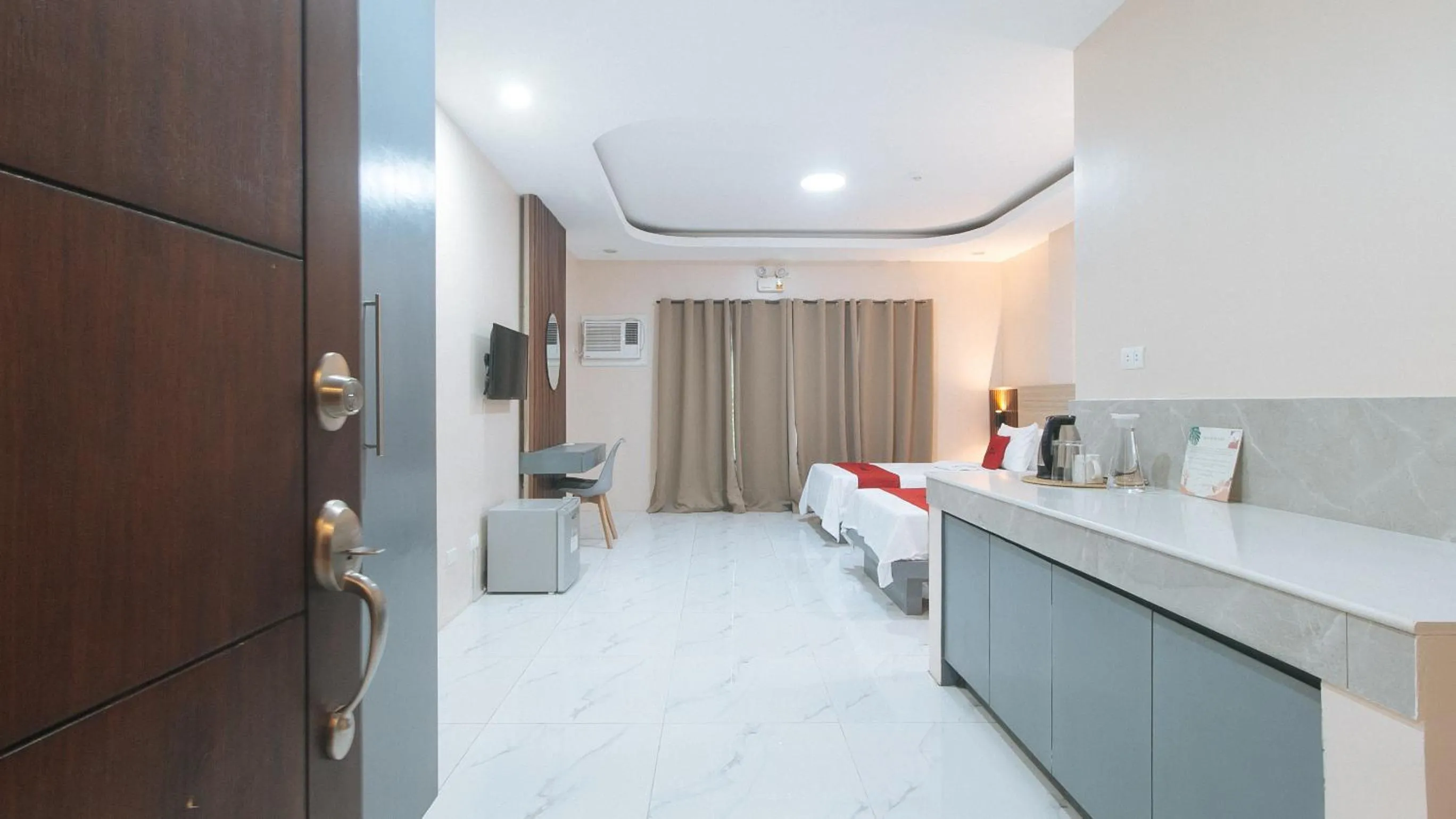 Bed in RedDoorz at Happy Stay Apartelle