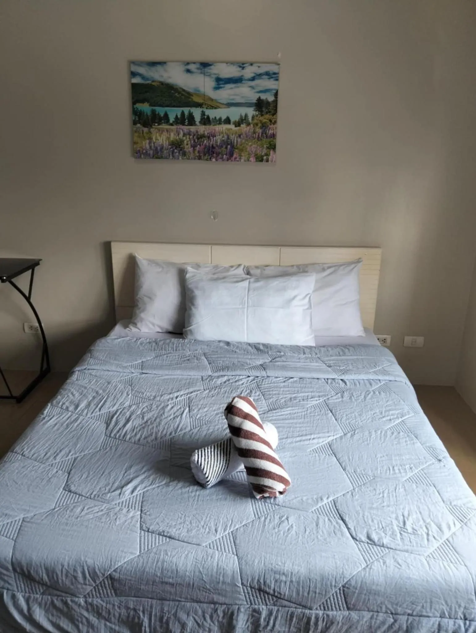 Bed in Henry's Newport Condotel