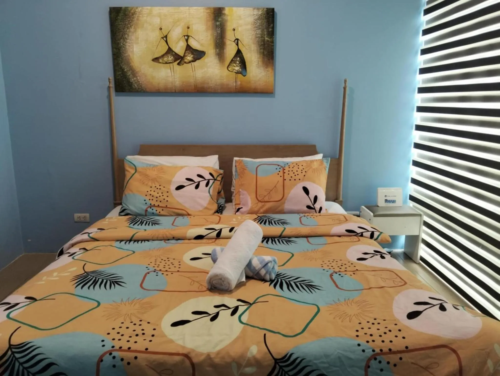 Bed in Henry's Newport Condotel