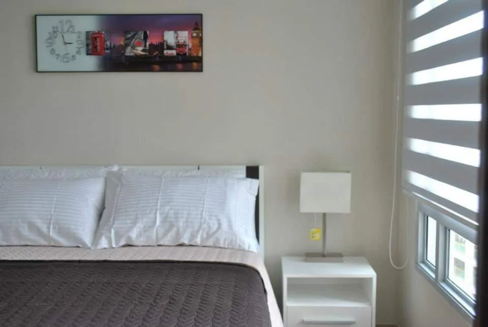 Bed in Henry's Newport Condotel