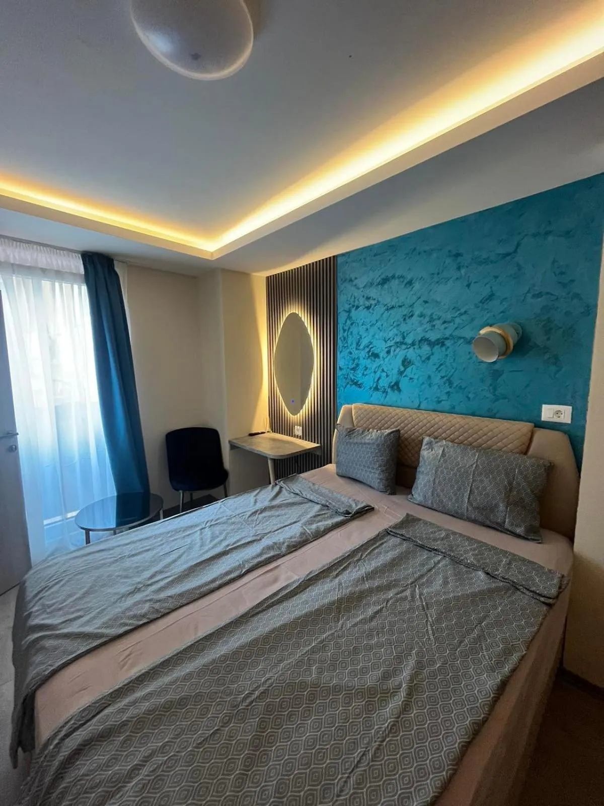 Bed in Square Vanilla Boutique Apart-Hotel