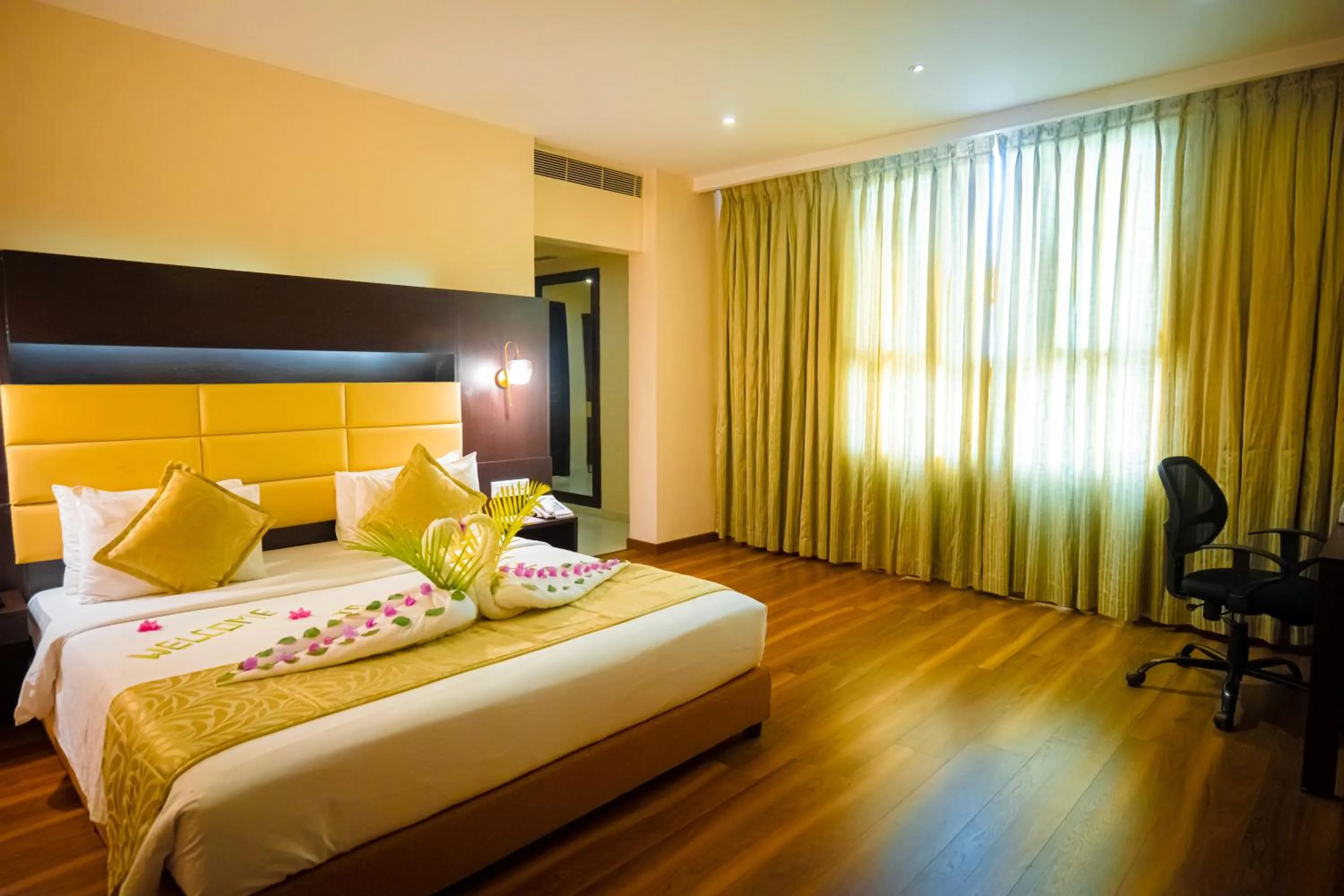 Bed in Poppys Hotel Madurai