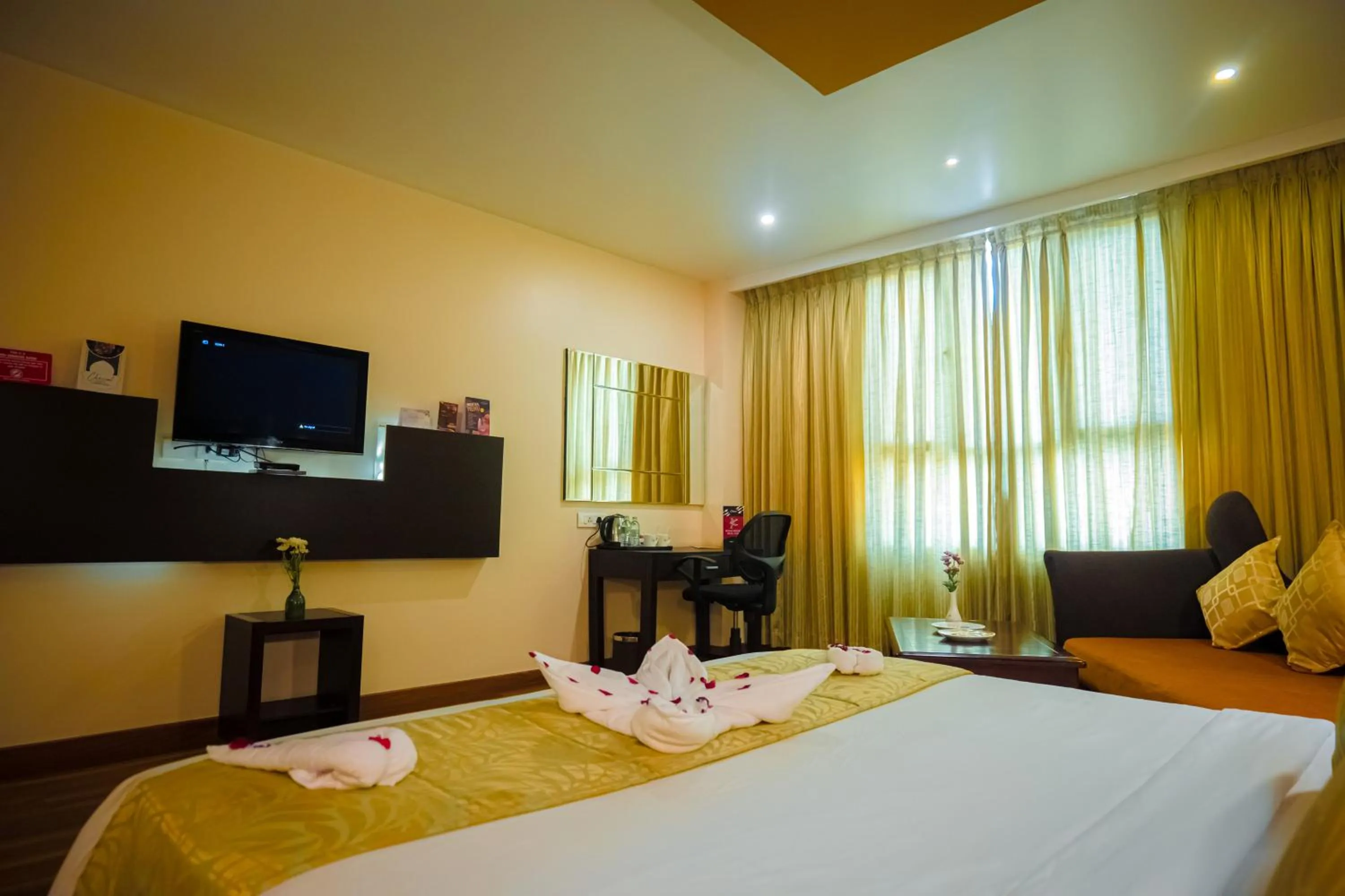 Bed in Poppys Hotel Madurai