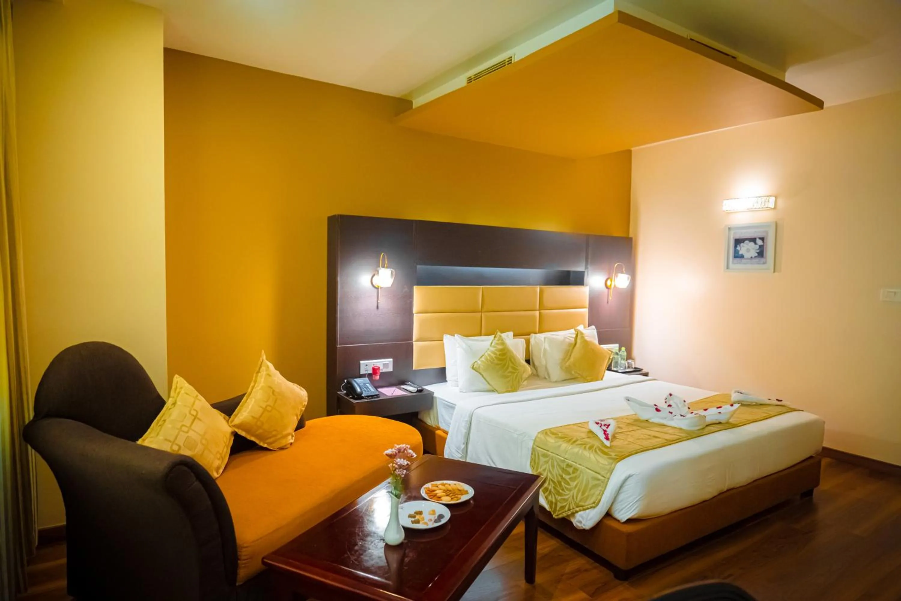 Bed in Poppys Hotel Madurai