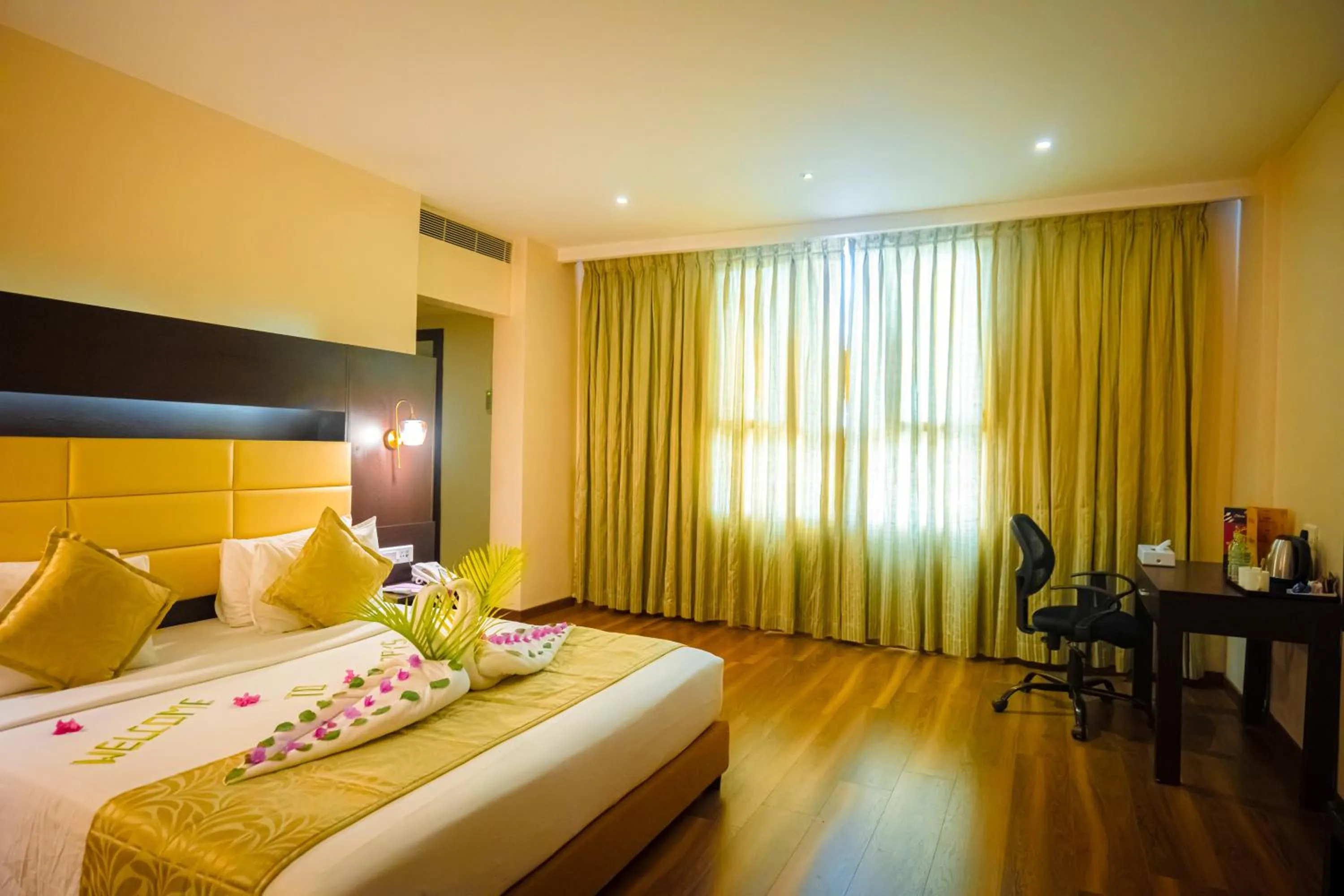 Bed in Poppys Hotel Madurai