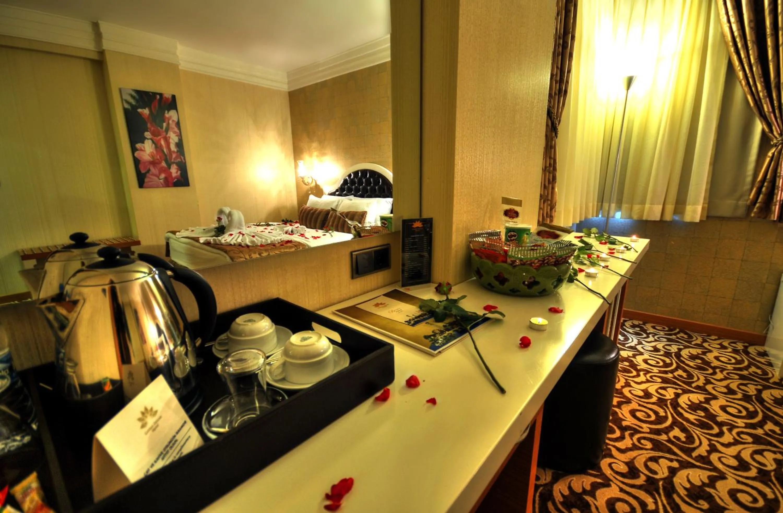 Bedroom in Golden Deluxe Hotel