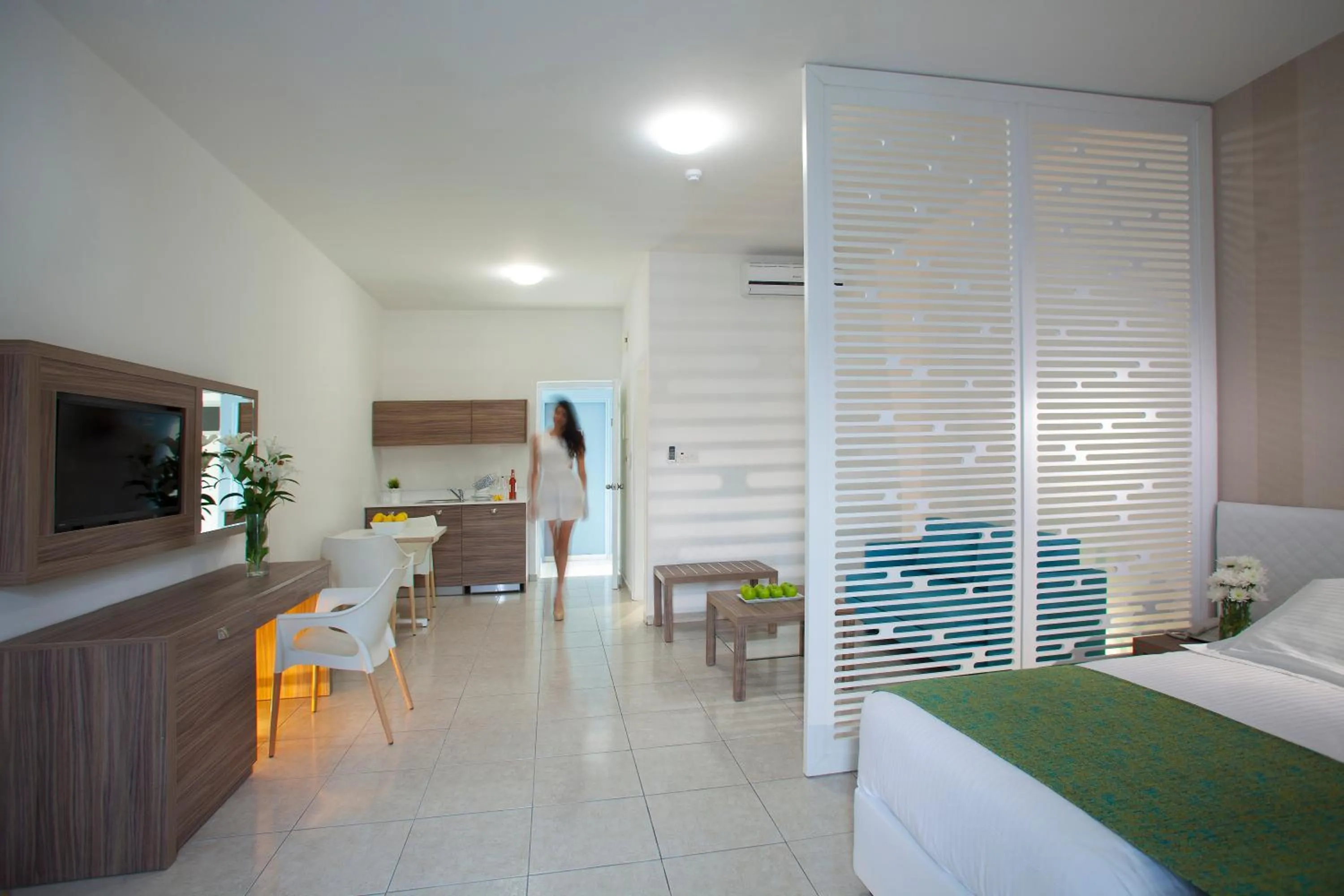 Bed in Princessa Vera Hotel Apartments