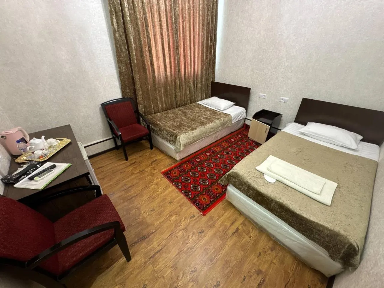 Bed in RATMINA HOTEL