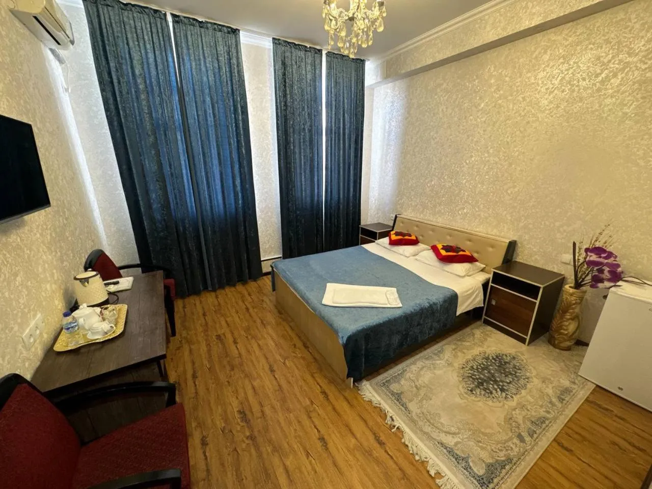 Bed in RATMINA HOTEL