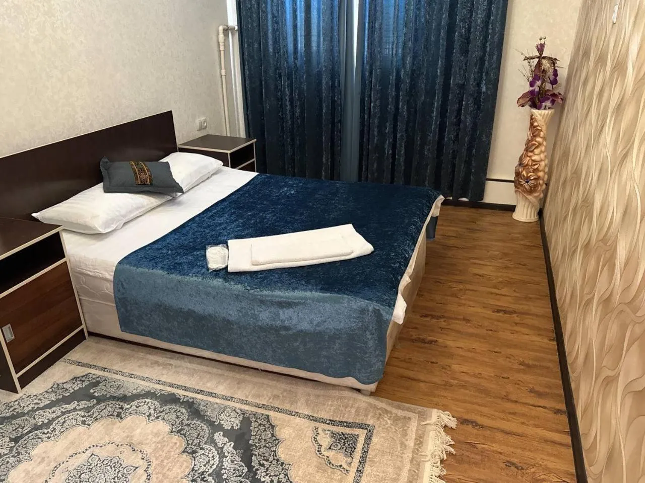 Bed in RATMINA HOTEL