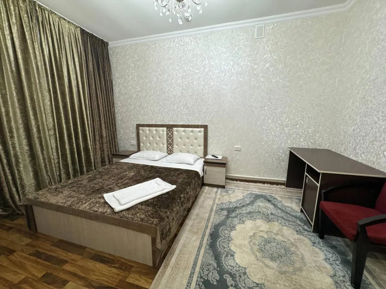 Bed in RATMINA HOTEL