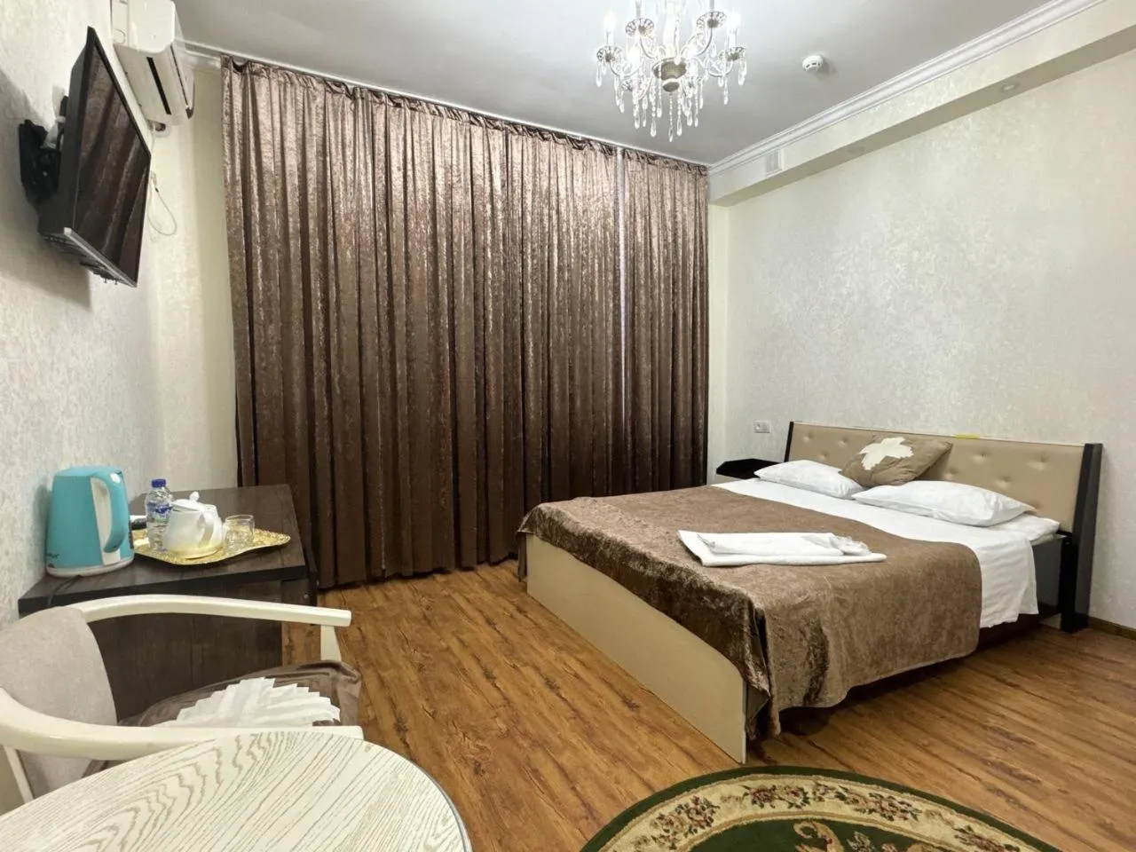 Bed in RATMINA HOTEL