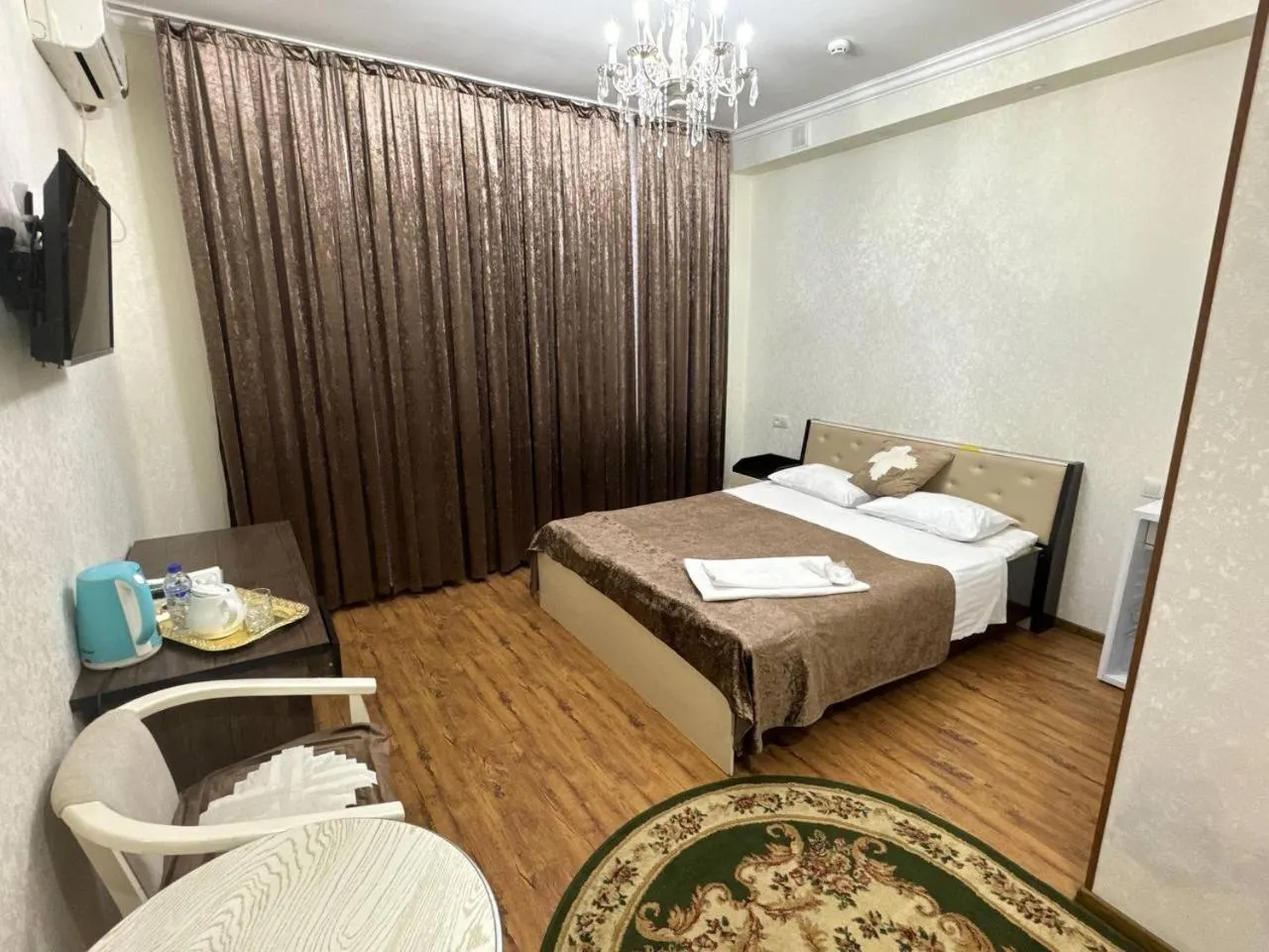 Bed in RATMINA HOTEL