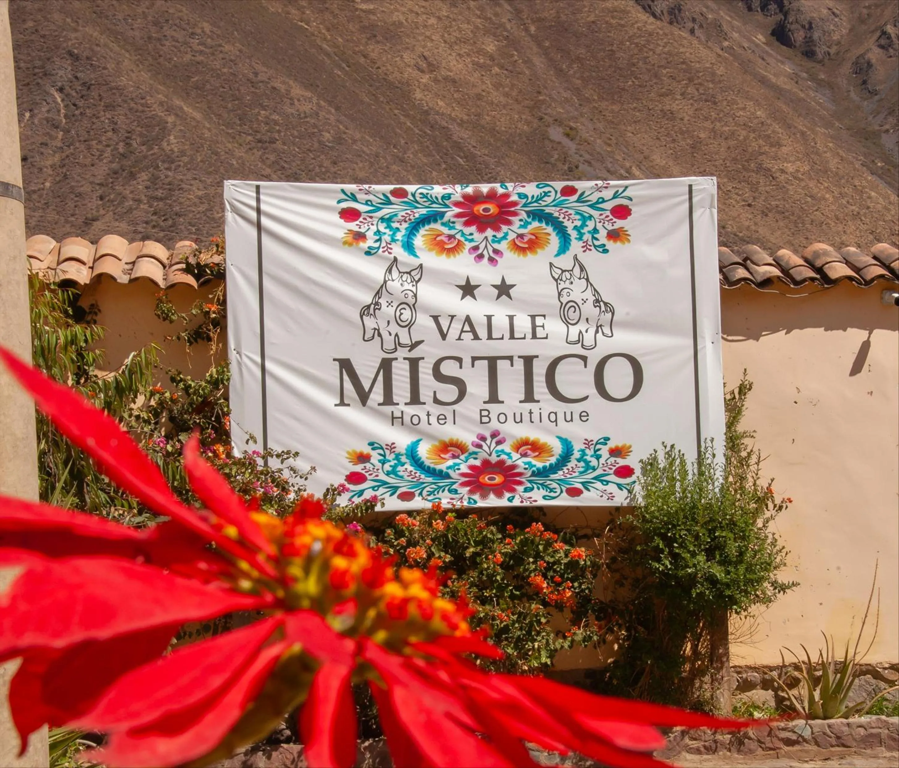 Property logo or sign in Hotel Valle Mistico