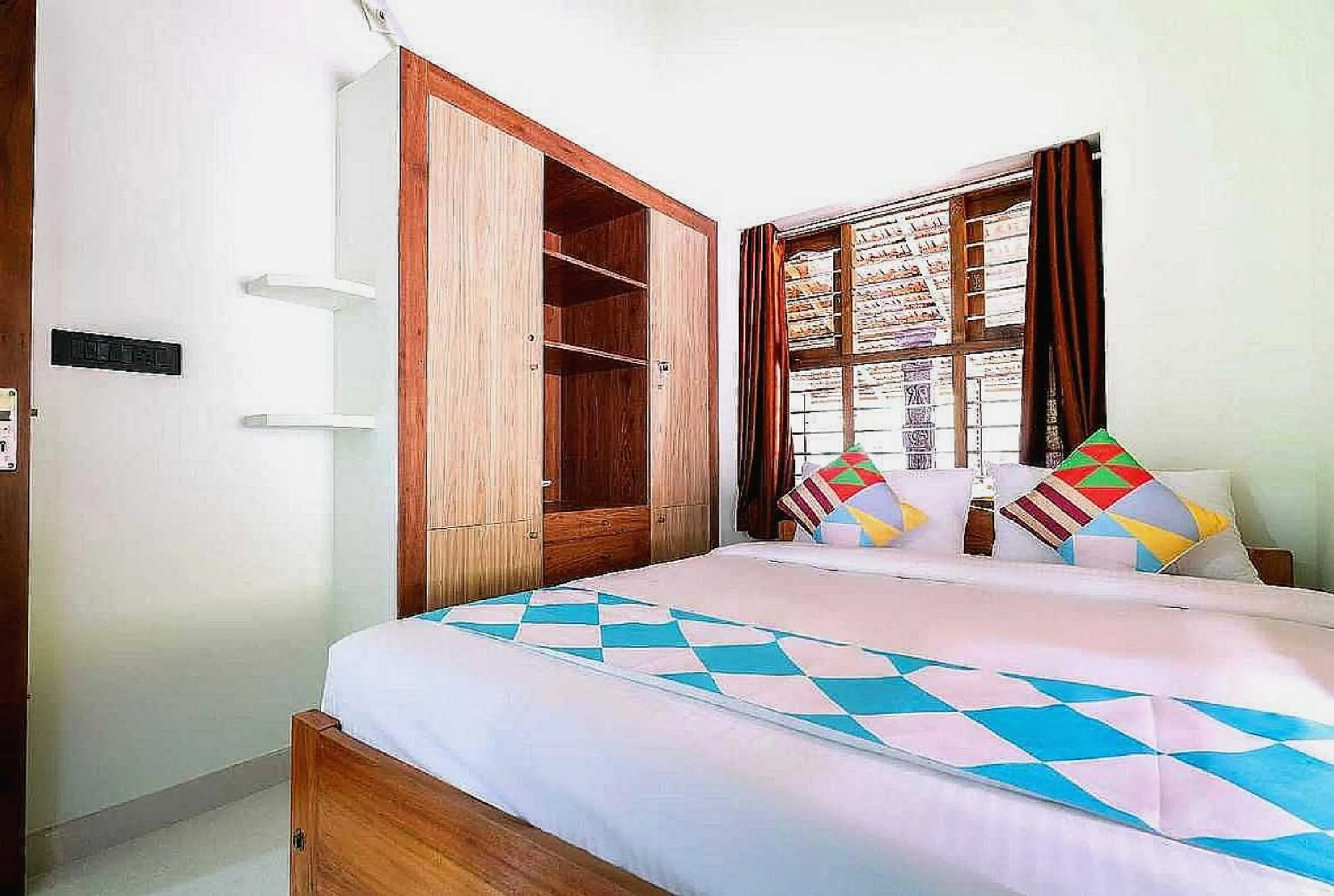 Bedroom in Hotel O ATHARVAM RESORT
