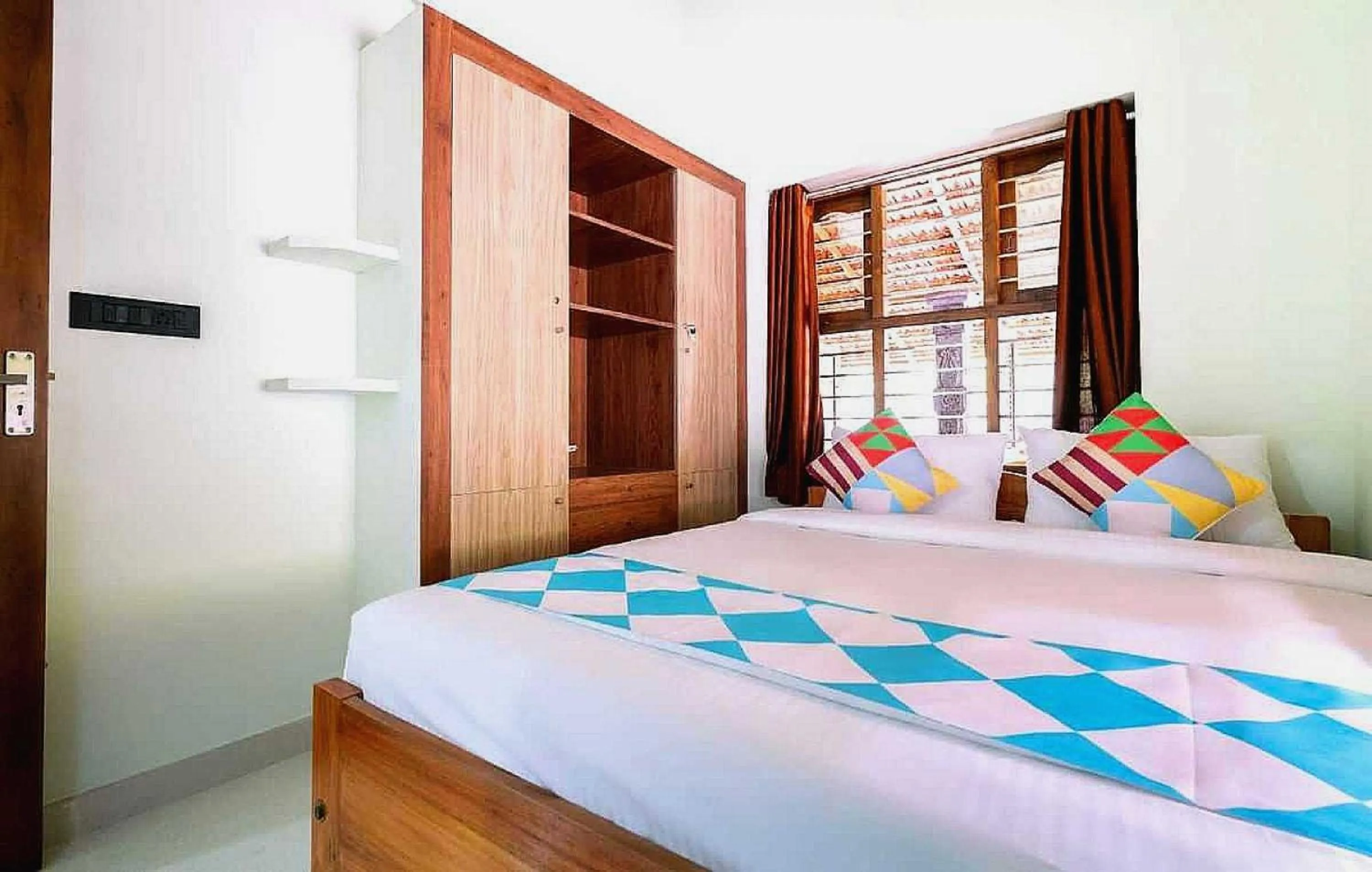 Bedroom in Hotel O ATHARVAM RESORT