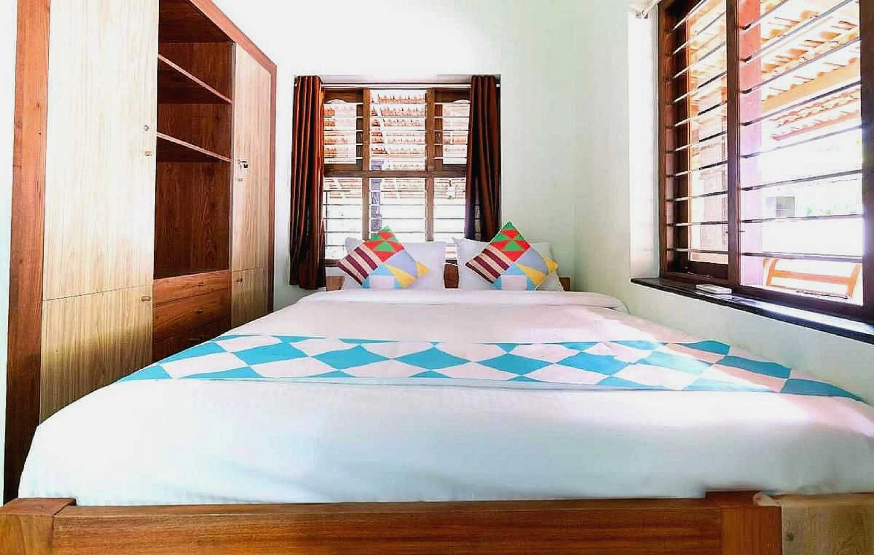 Bedroom in Hotel O ATHARVAM RESORT