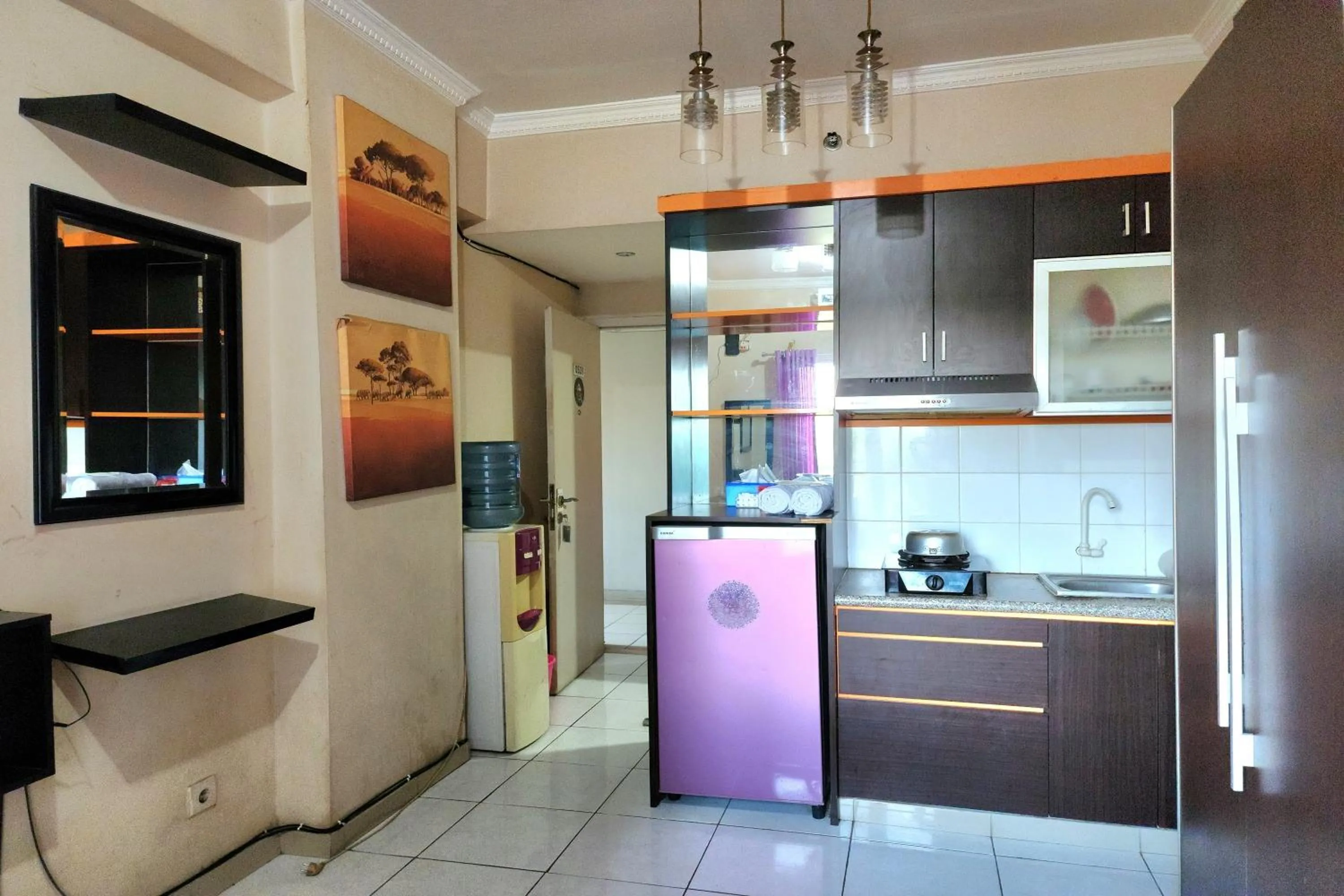 Kitchen or kitchenette in Queen Room 2 @ Grand Center Point Apartment