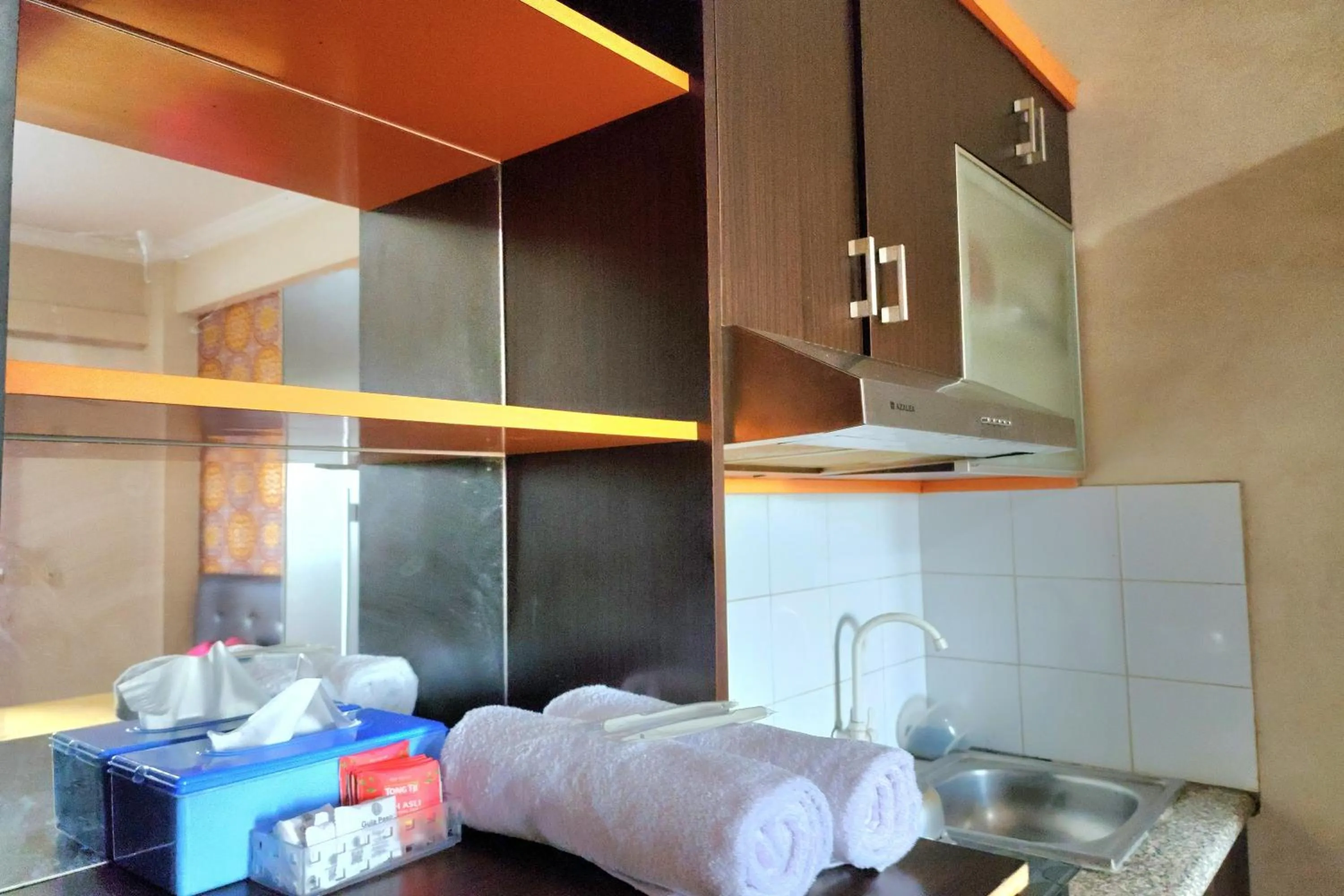 Kitchen or kitchenette in Queen Room 2 @ Grand Center Point Apartment