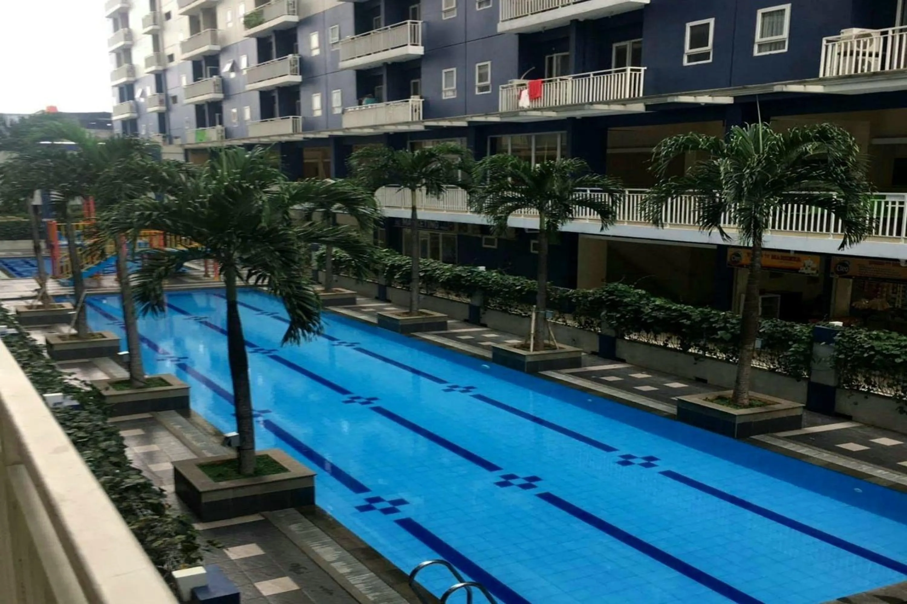 Swimming pool in Queen Room 2 @ Grand Center Point Apartment