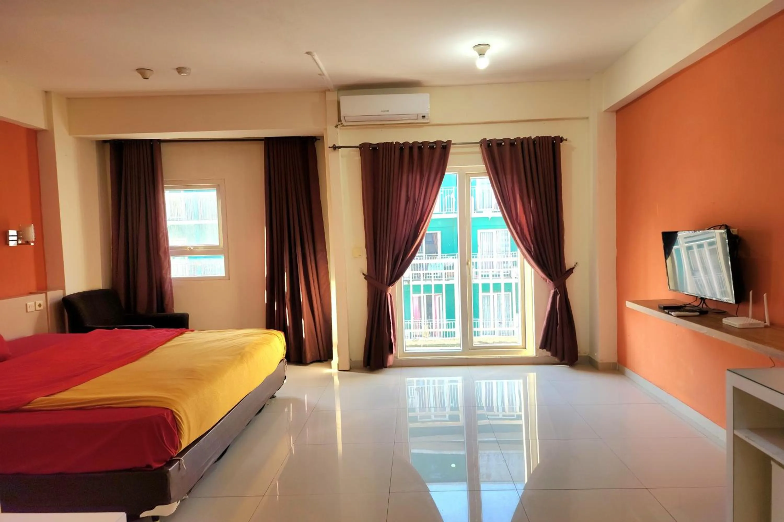 Bed in Queen Room 2 @ Grand Center Point Apartment