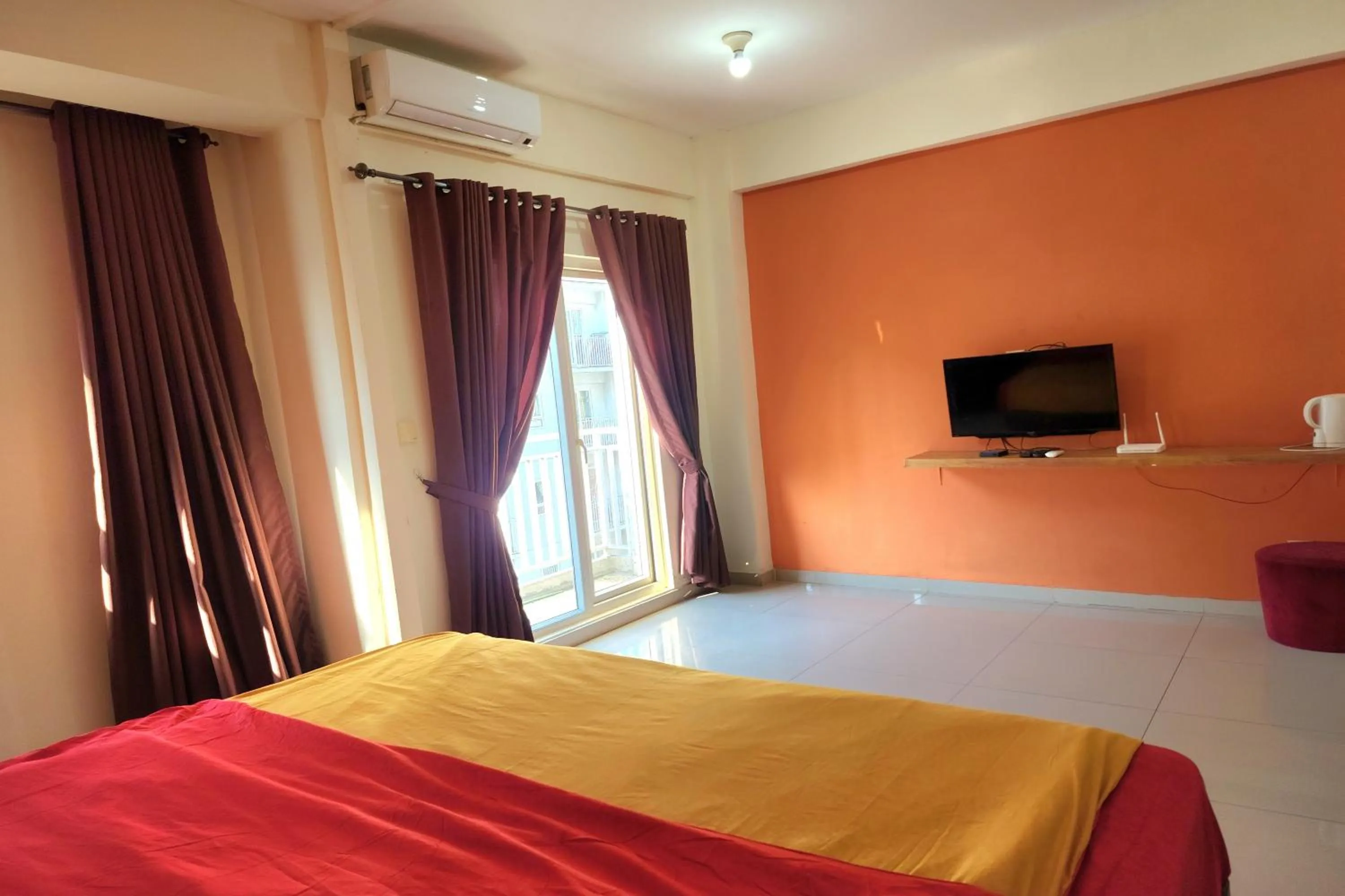 Bed in Queen Room 2 @ Grand Center Point Apartment