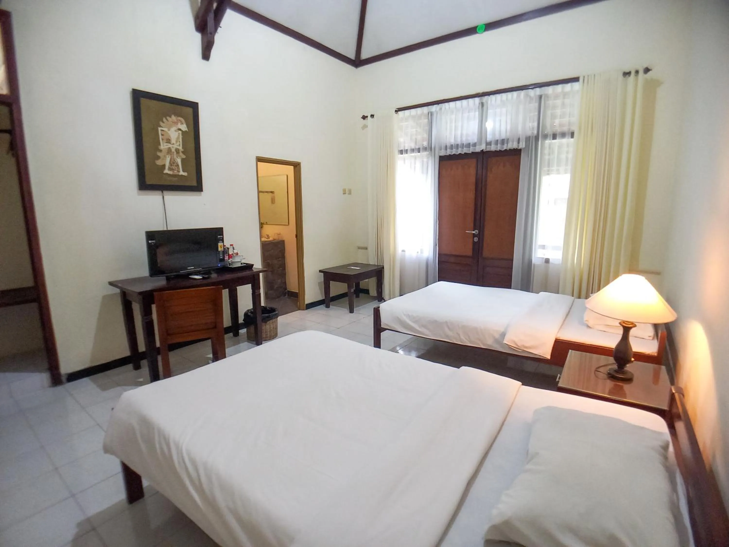 TV and multimedia, Bed in Margo Utomo Hill View Resort