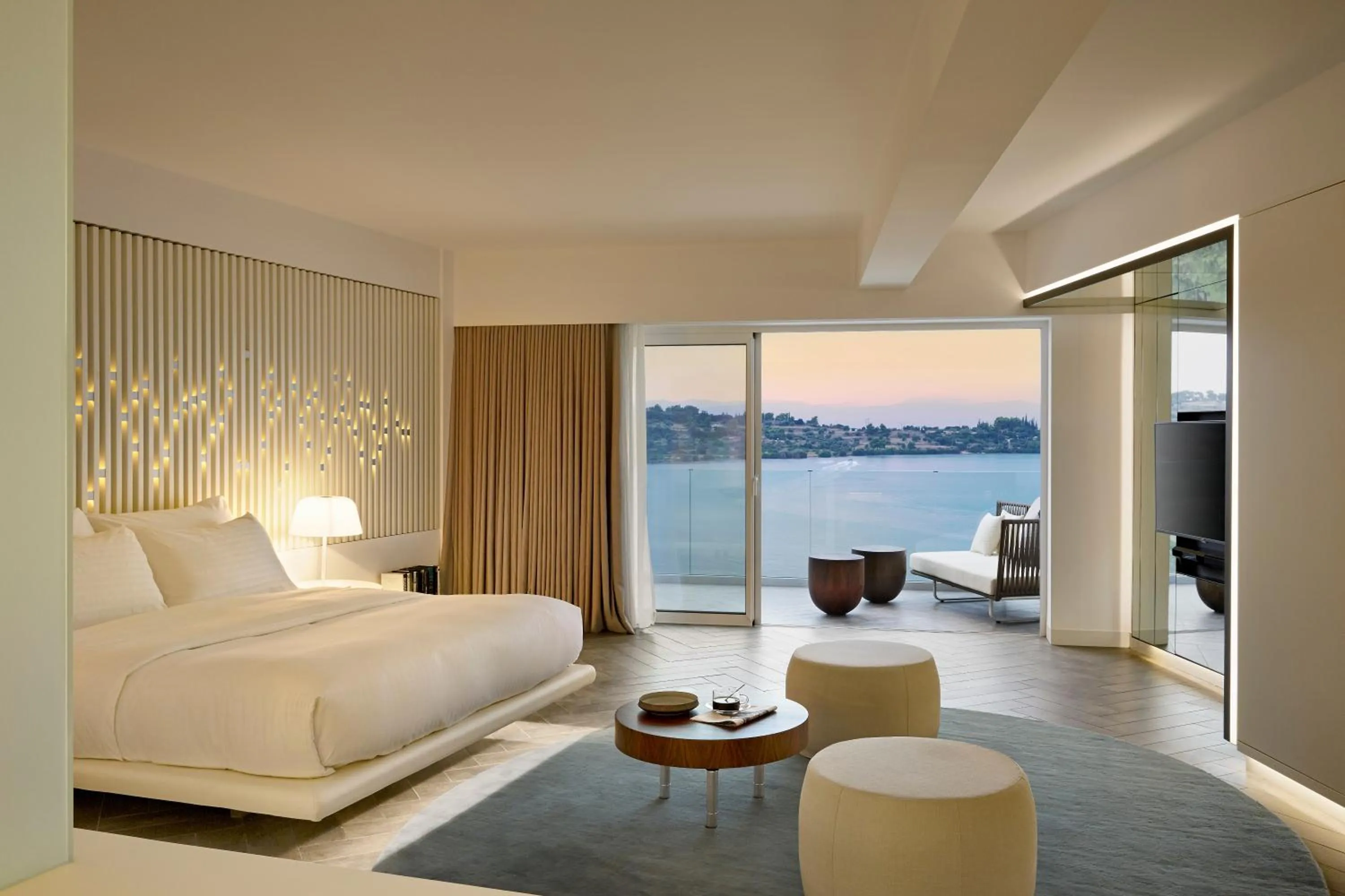 Seating area, Bed in Nikki Beach Resort & Spa Porto Heli