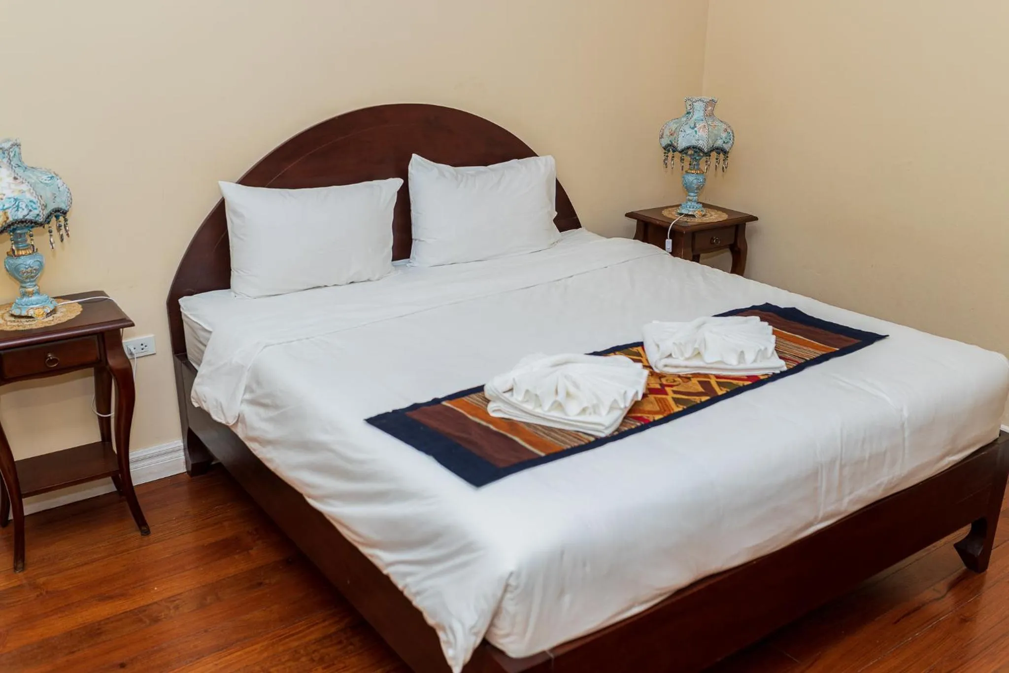 Bed in Le Luxe Boutique Hotel