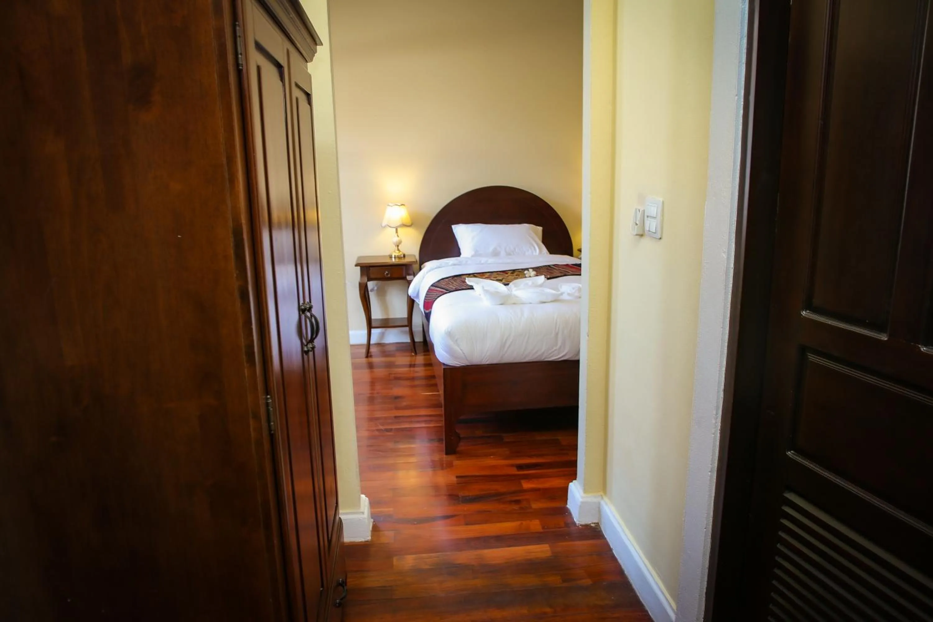 Bed in Le Luxe Boutique Hotel