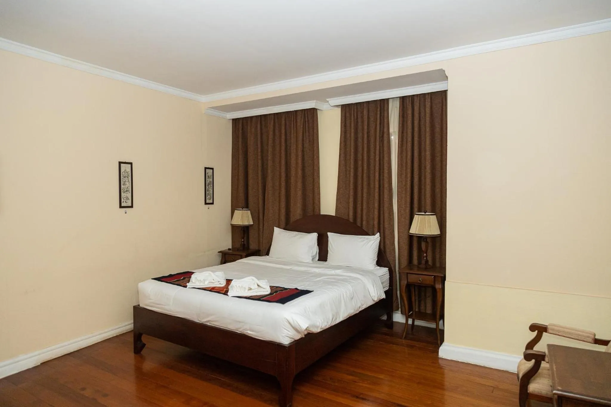 Bed in Le Luxe Boutique Hotel