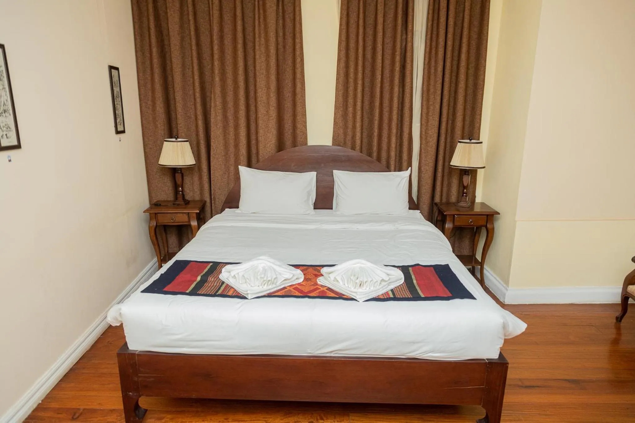 Bed in Le Luxe Boutique Hotel